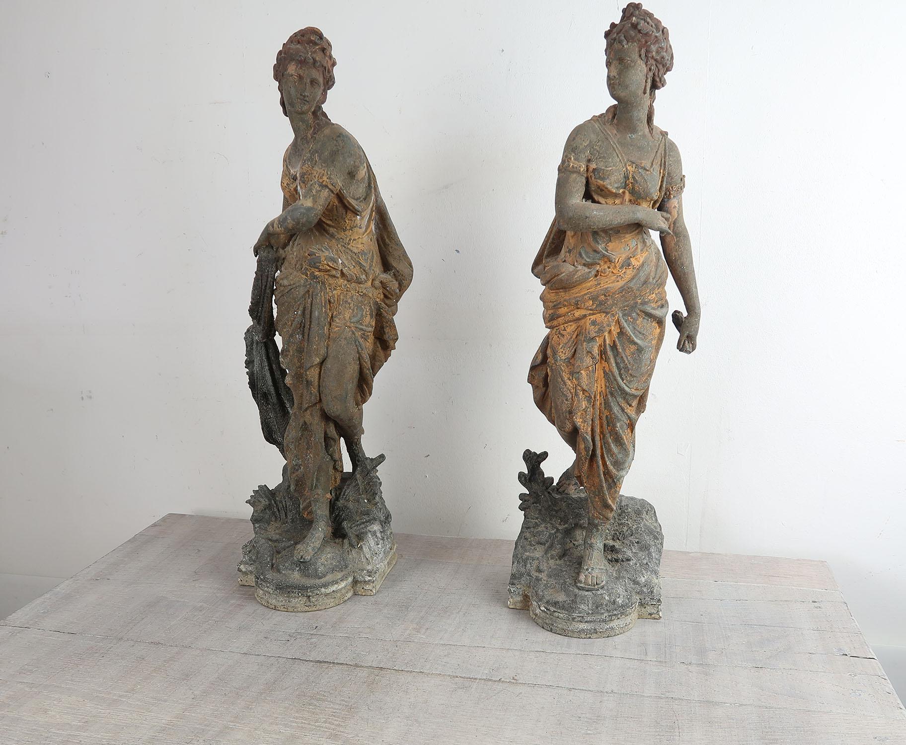 Wonderful pair of spelter Neo-classical maidens.

Great patina with traces of old rust coloured paint.

It looks like they have been used as garden features

One of the figures is in very good condition. The other figure has a part of the back