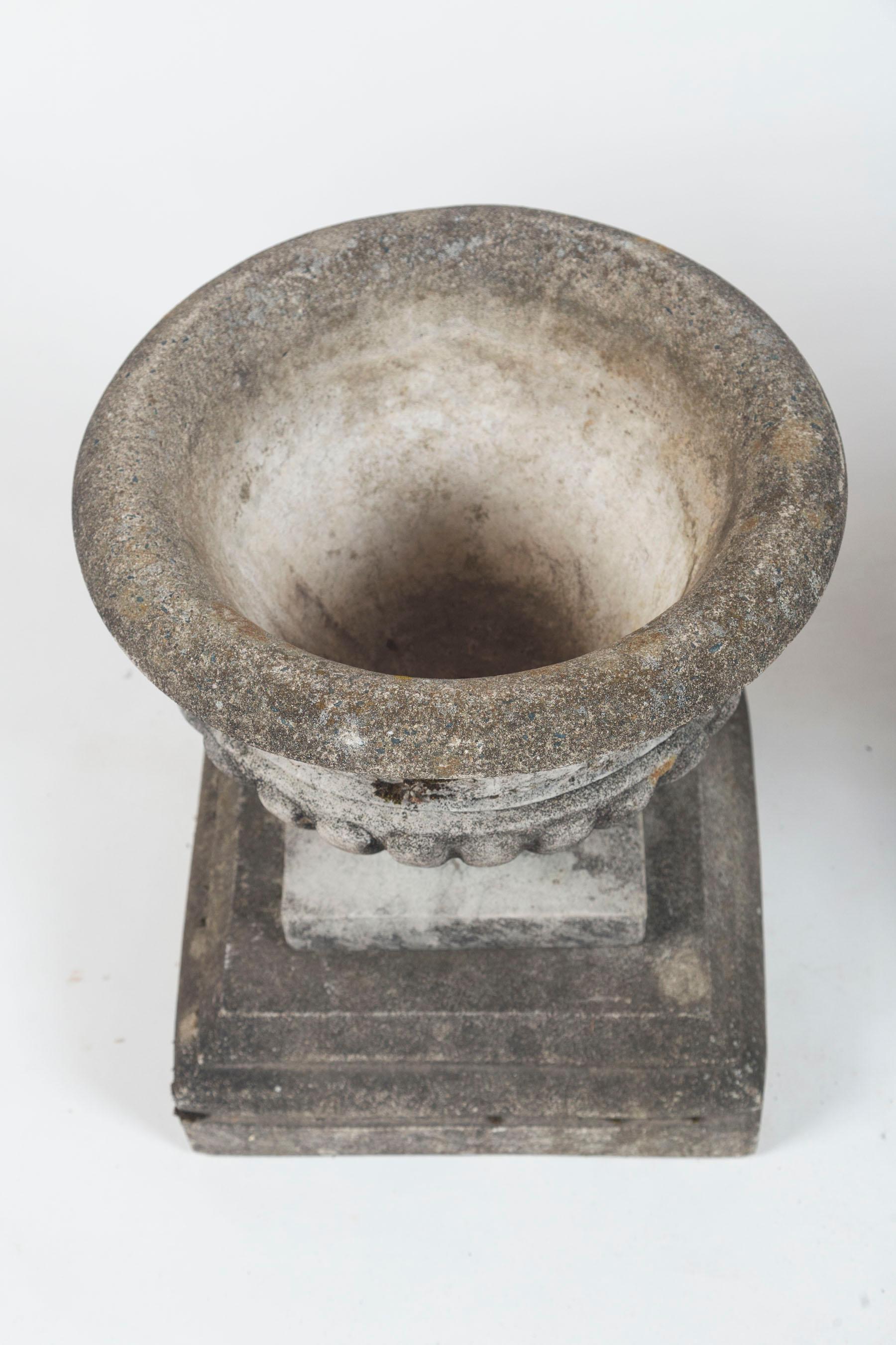 Pair of Antique Cast Stone Garden Urns on Bases, circa 1920 1