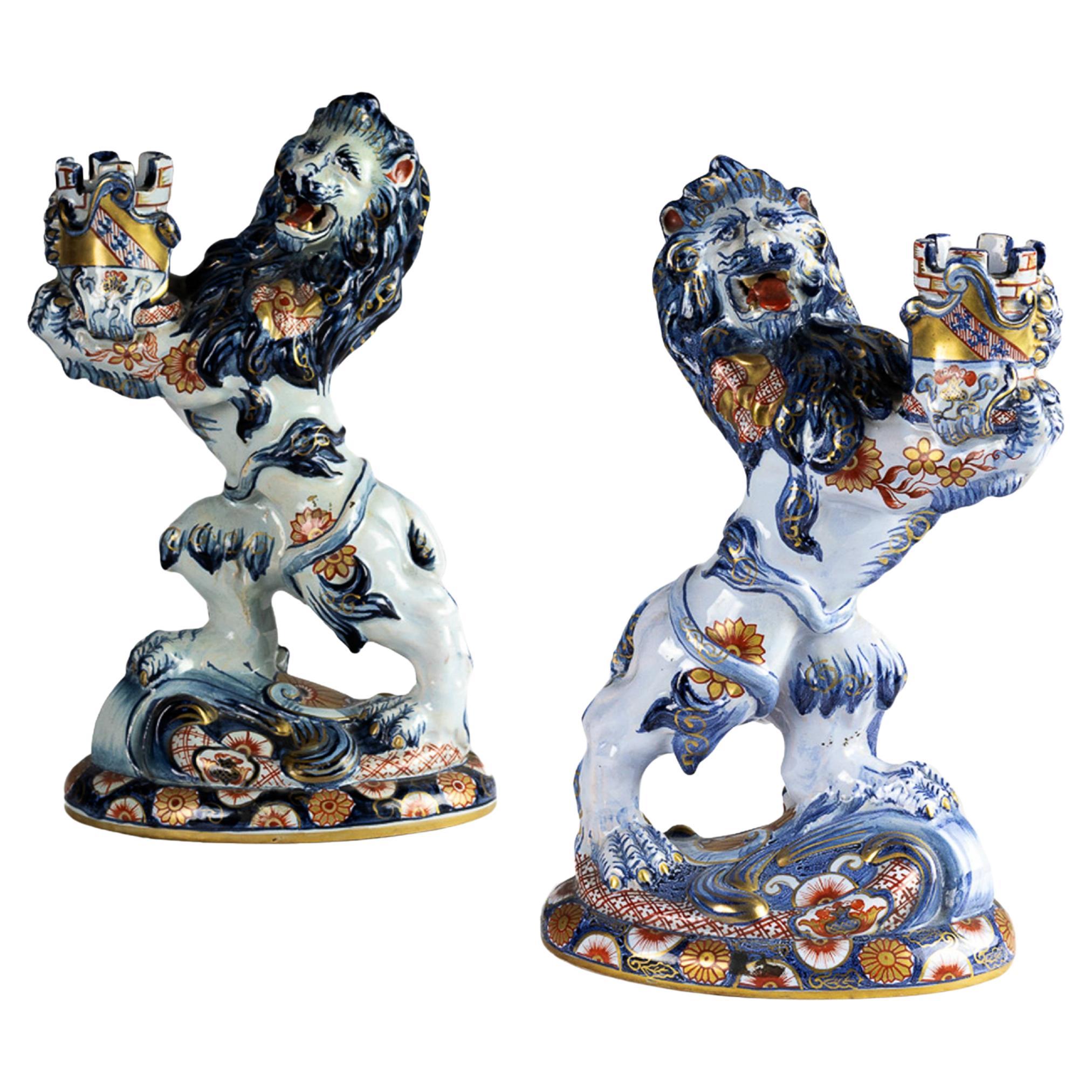 Paire de bougeoirs Lions anciens en céramique d'Emile Gallé