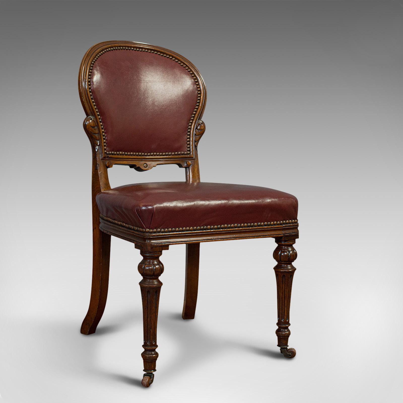 This is a pair of antique morning room chairs. An English, walnut and leather seat by Doveston, Bird & Hull of Manchester, dating to the early Victorian period, circa 1860.

Superb antique chairs
Displaying a desirable aged patina
Quality walnut