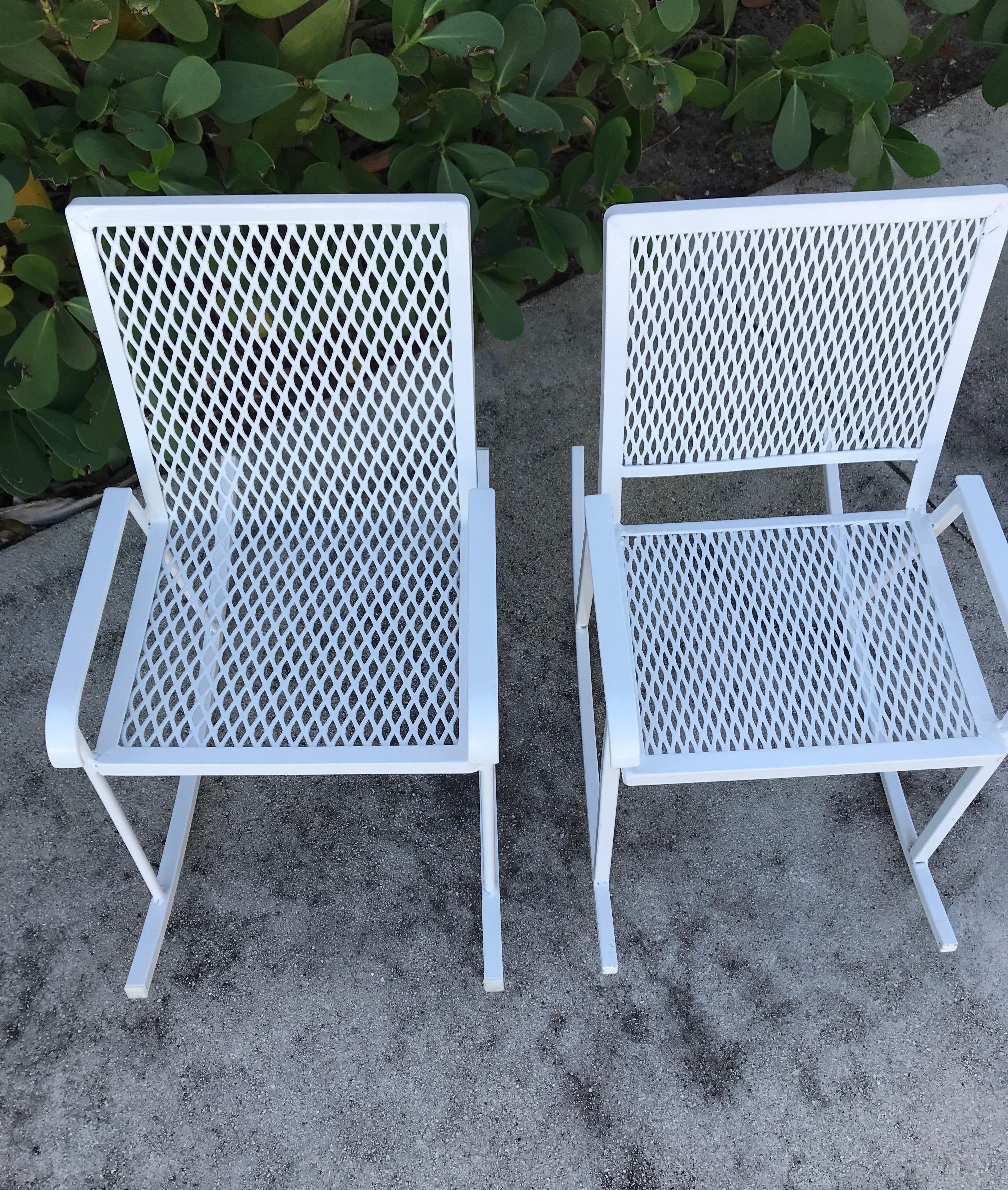 Very sweet pair of white wrought iron children's rocking chairs. Newly sandblasted and powder coated finish.