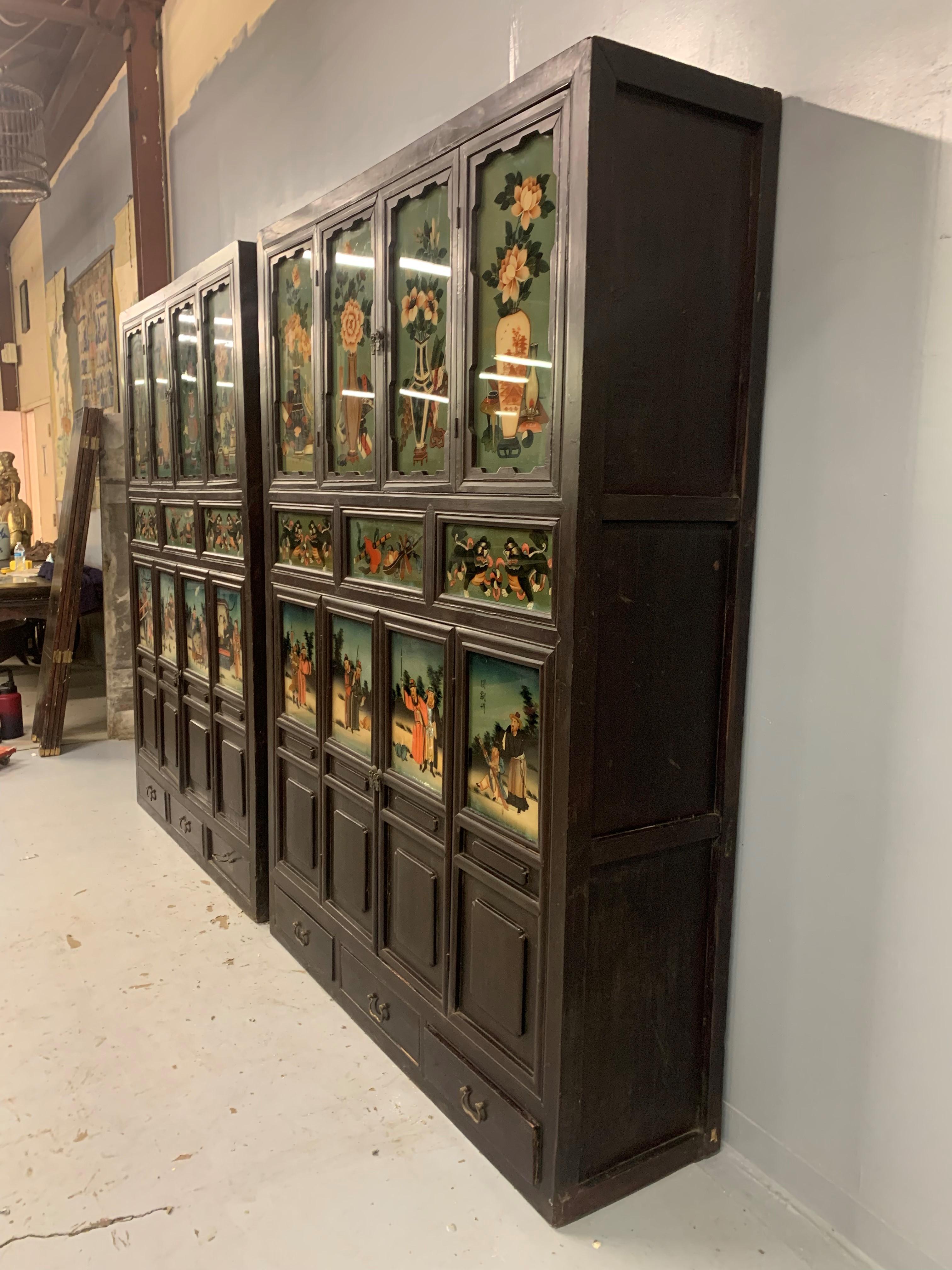 Brass Pair of Antique Chinese Cabinets with Reverse Painted Glass Panels For Sale
