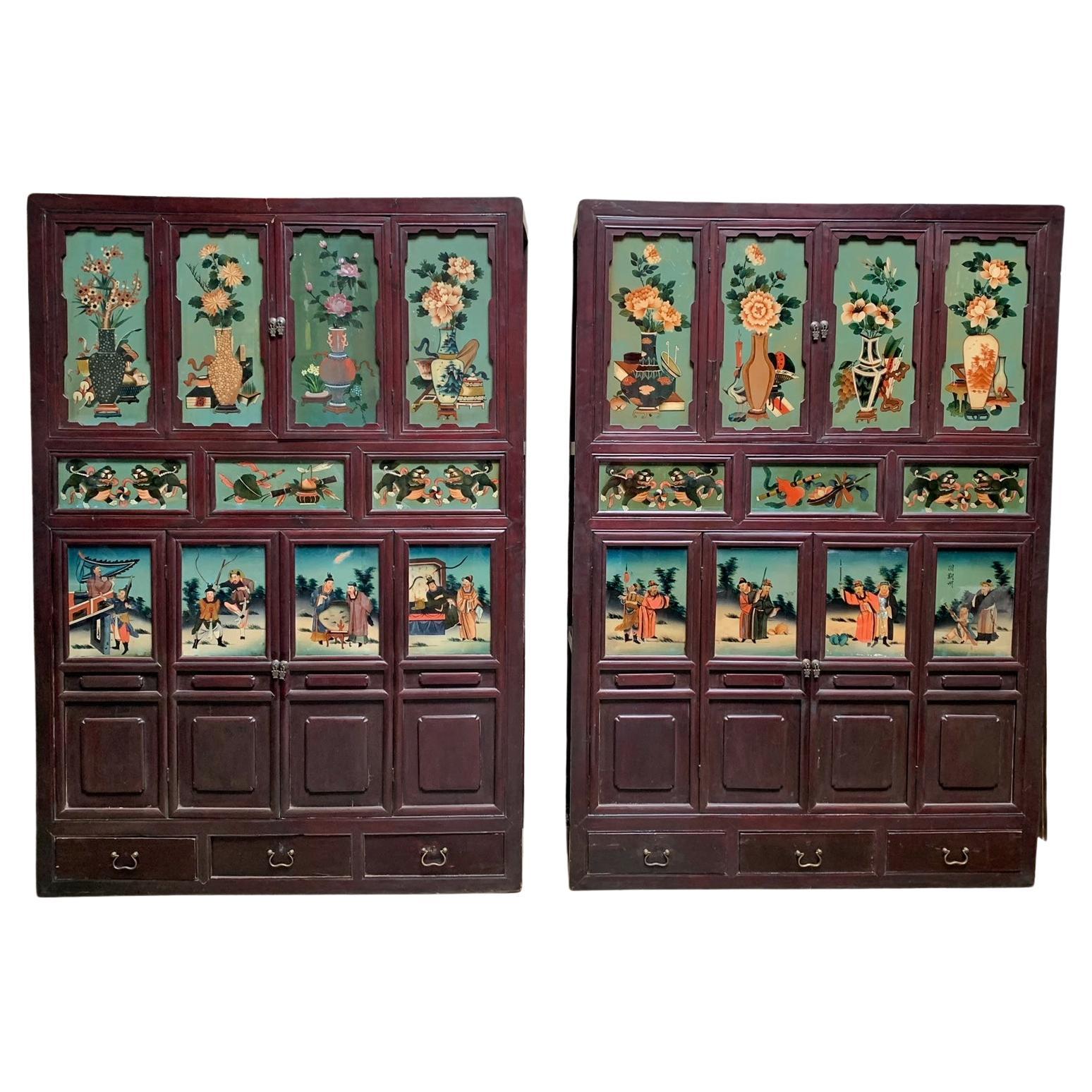 Pair of Antique Chinese Cabinets with Reverse Painted Glass Panels For Sale