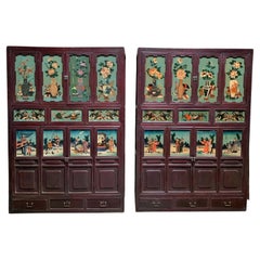 Pair of Antique Chinese Cabinets with Reverse Painted Glass Panels