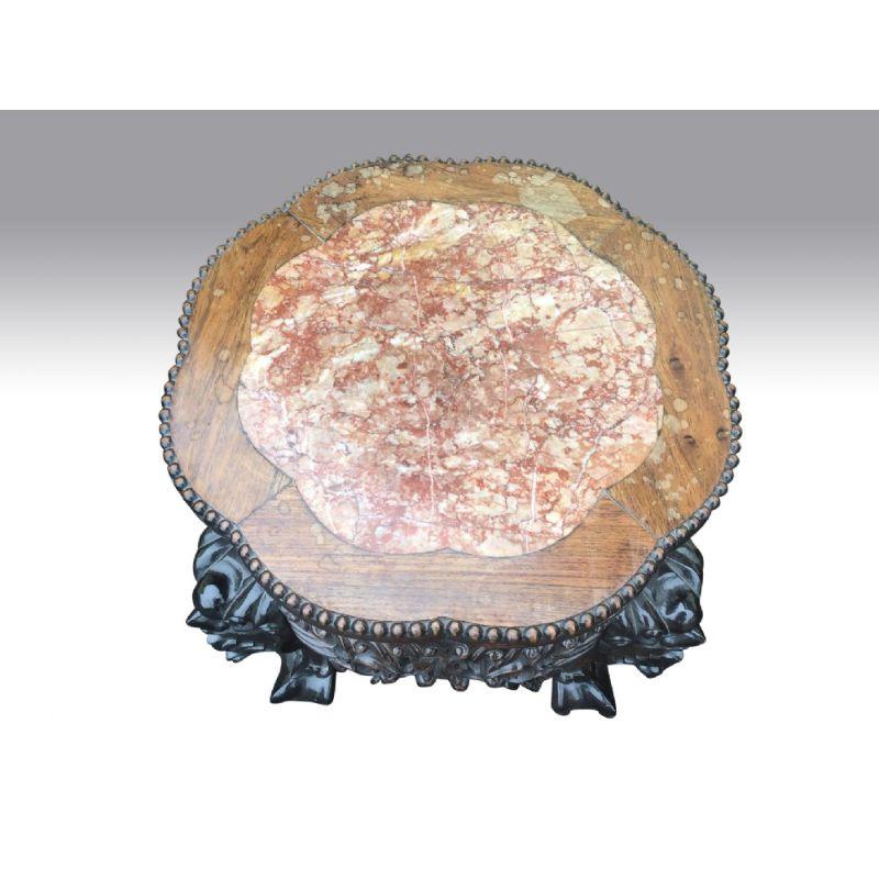 Pair of antique Chinese cherrywood marble top table pot stands. 

All firm of joint. 
Circa 1900. 
18ins high x 17ins diameter 
 
Declaration: This item is antique. The date of manufacture has been declared as 1890. 

Dimensions: 
Height =