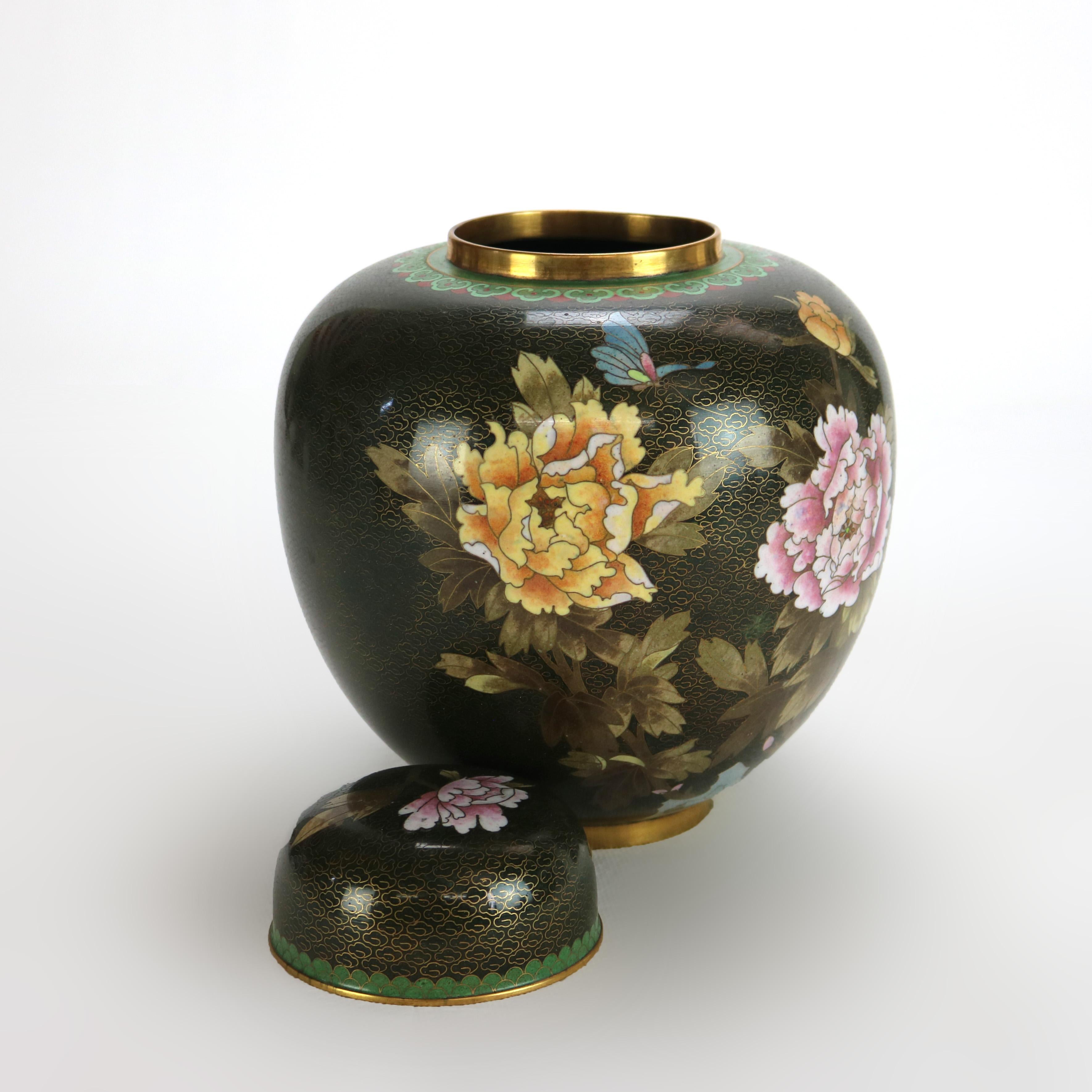 Pair of Antique Chinese Cloisonne Ginger Jars with Garden Flowers C1920

Measures - 9.5