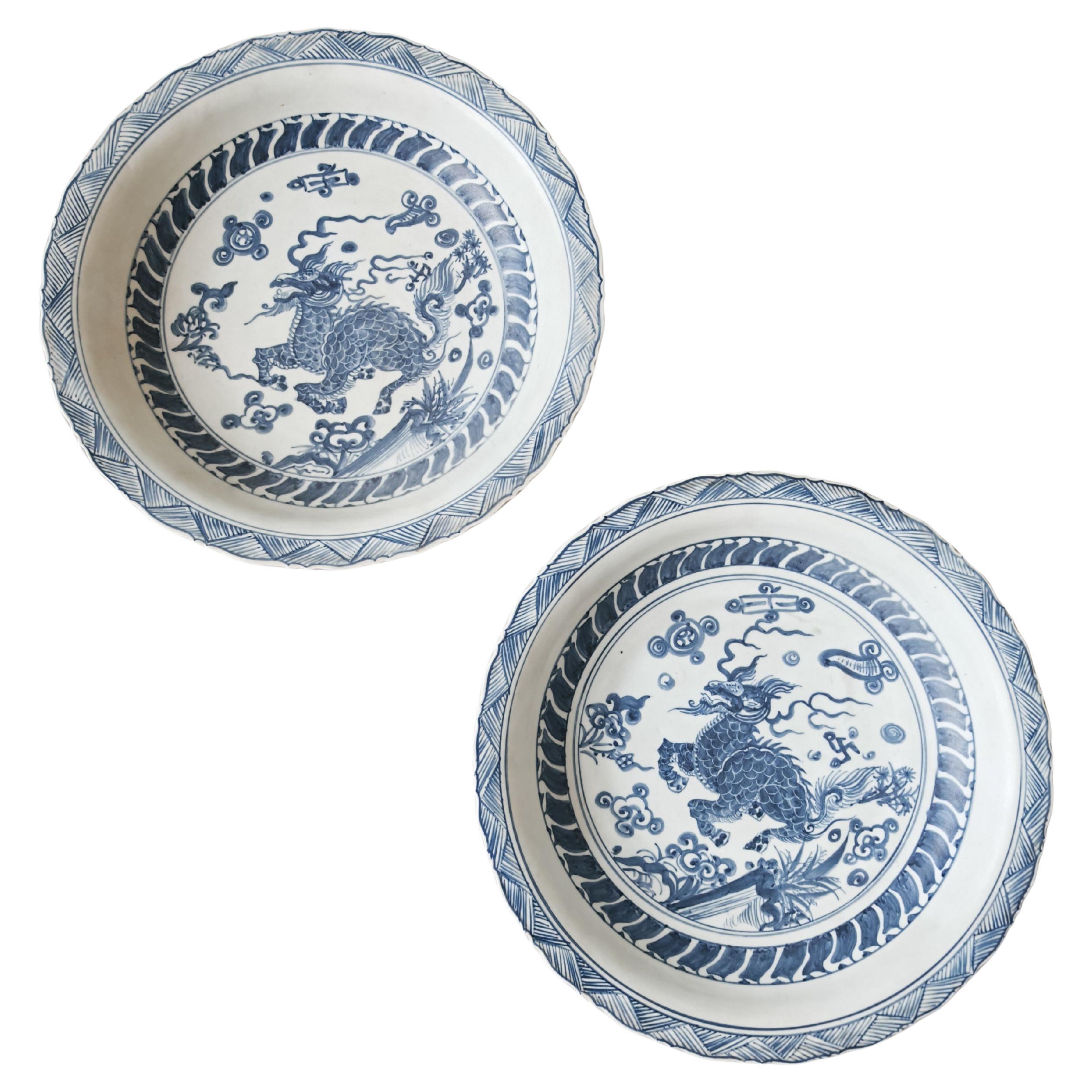 Pair of Antique Chinese Decorative Ceramic Plates with a dragon pattern