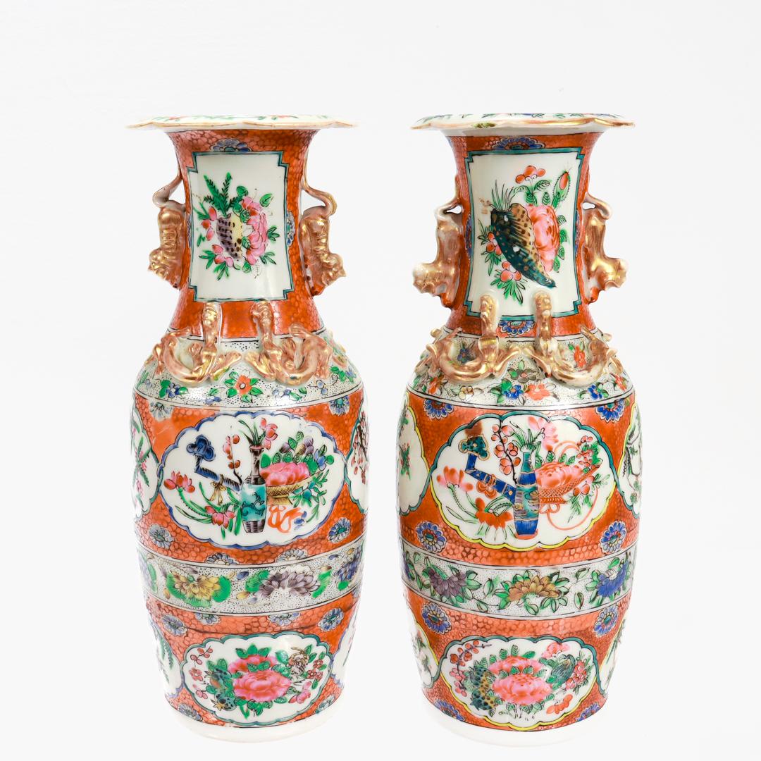 Gilt Pair of Antique Chinese Export Famille Rose Canton Orange Ground Vases or Urns For Sale