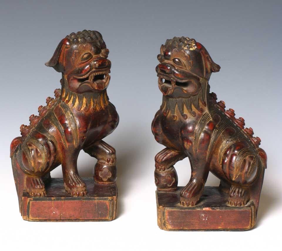 Hand-Carved Pair of Antique Chinese Fu Dogs For Sale
