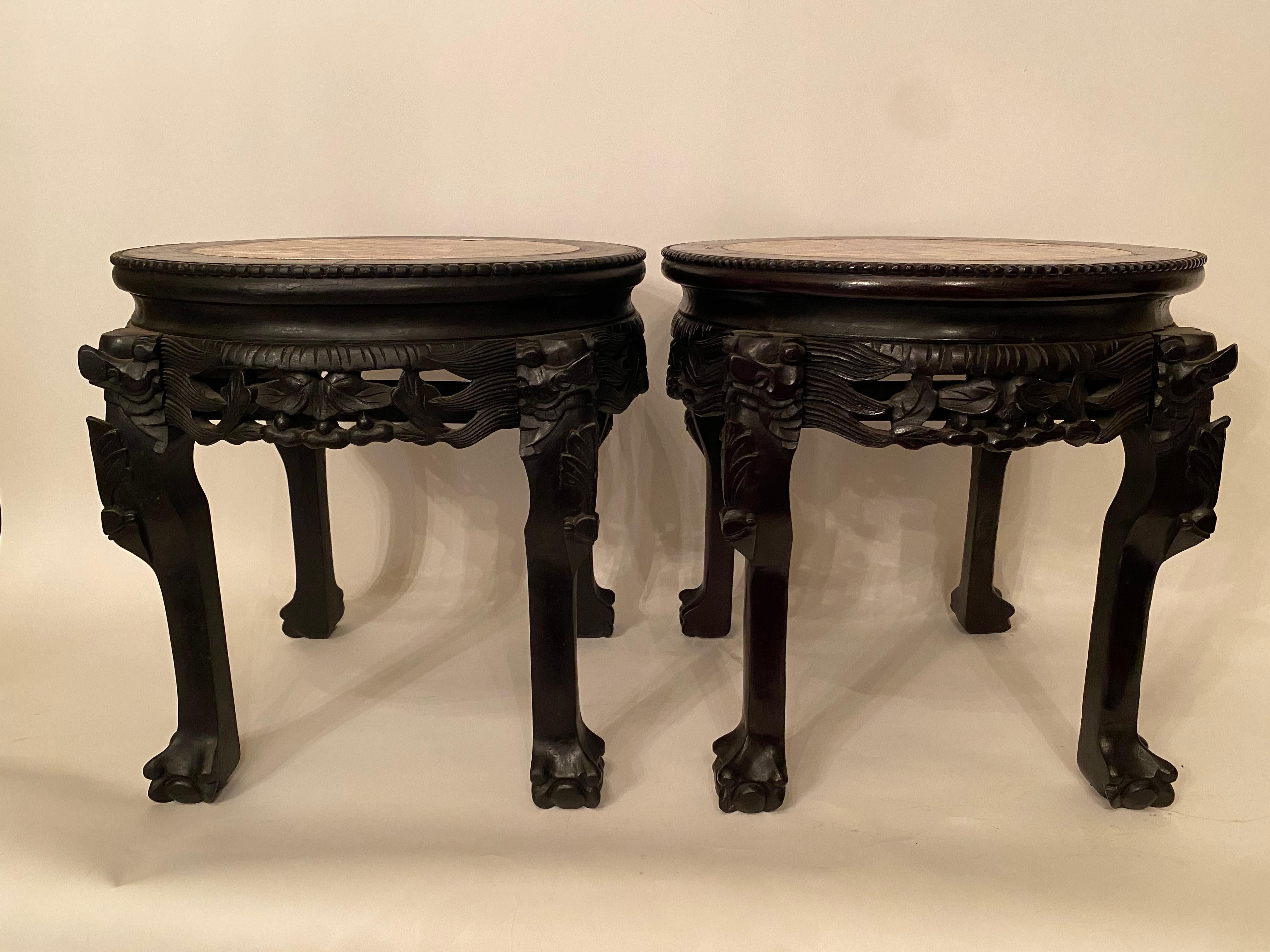 Pair of antique Chinese hardwood flower stands rouge marble top insert, 20th century. Measures: H 18”, D 20”.