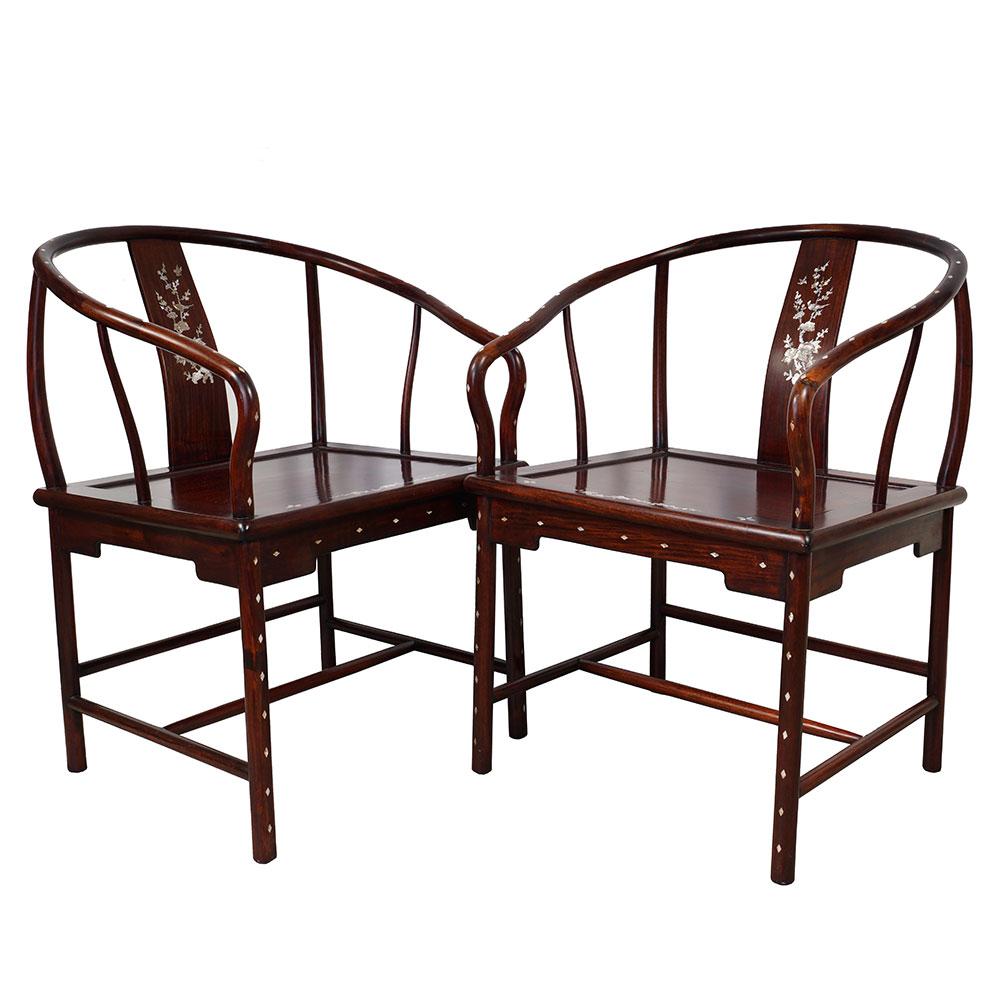 This gorgeous pair of Chinese antique Horseshoe Back Armchairs were made from solid rosewood with Mother of Pearl inlay around the armrest and back. Very solid and sturdy. It features a simple carving works on the back and front with detailed Mother