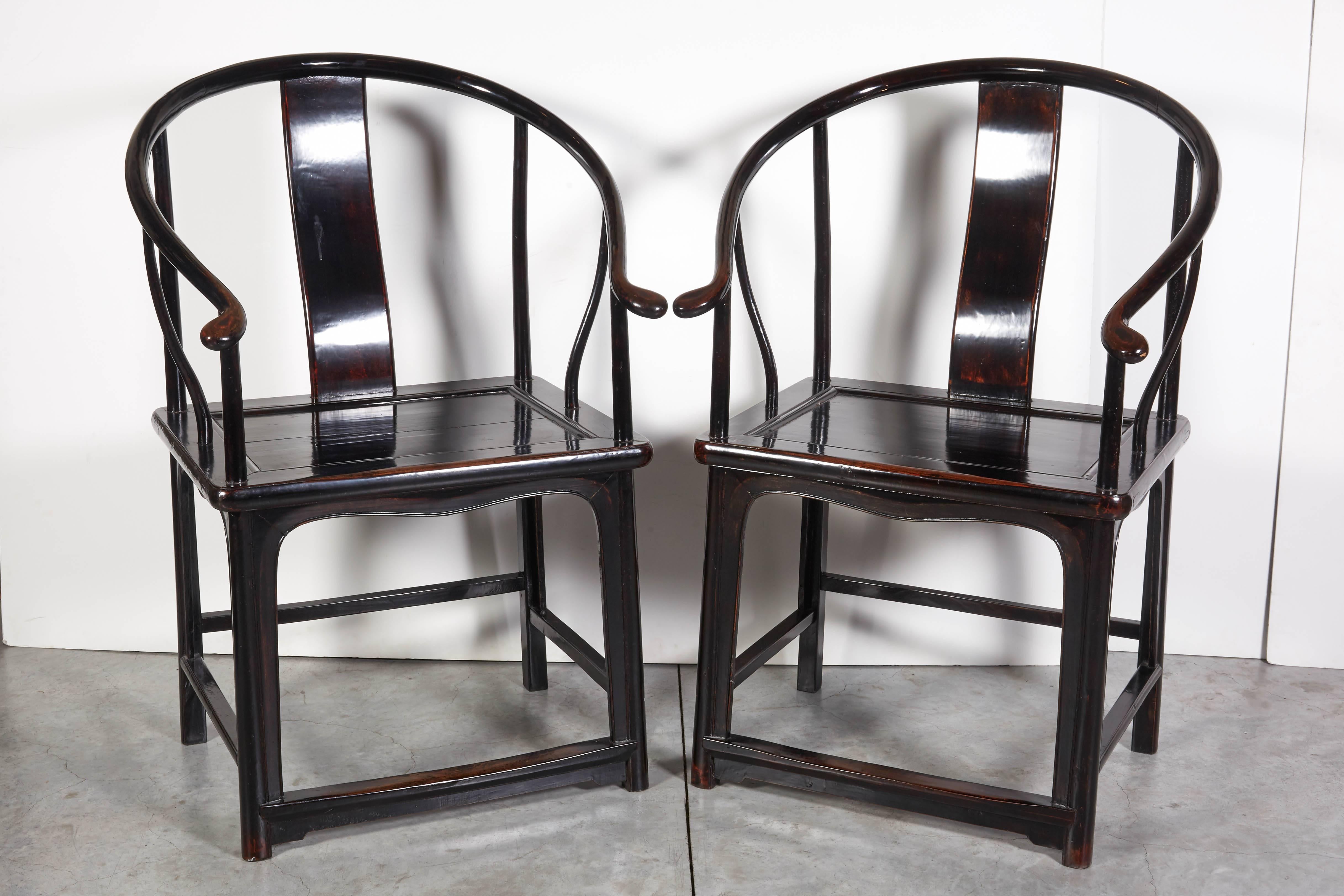 An unusually beautiful pair of antique Chinese horseshoe back chairs with striking lacquer finish. These gracefully shaped chairs will add a touch of elegance to any space.
Dimensions: L 26, D 21 seat H 20, back H 39.5.