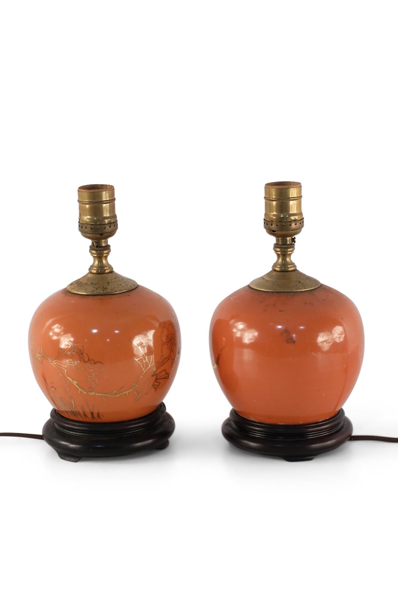 Chinese Export Pair of Antique Chinese Orange and Gold Floral Round Porcelain Table Lamps For Sale