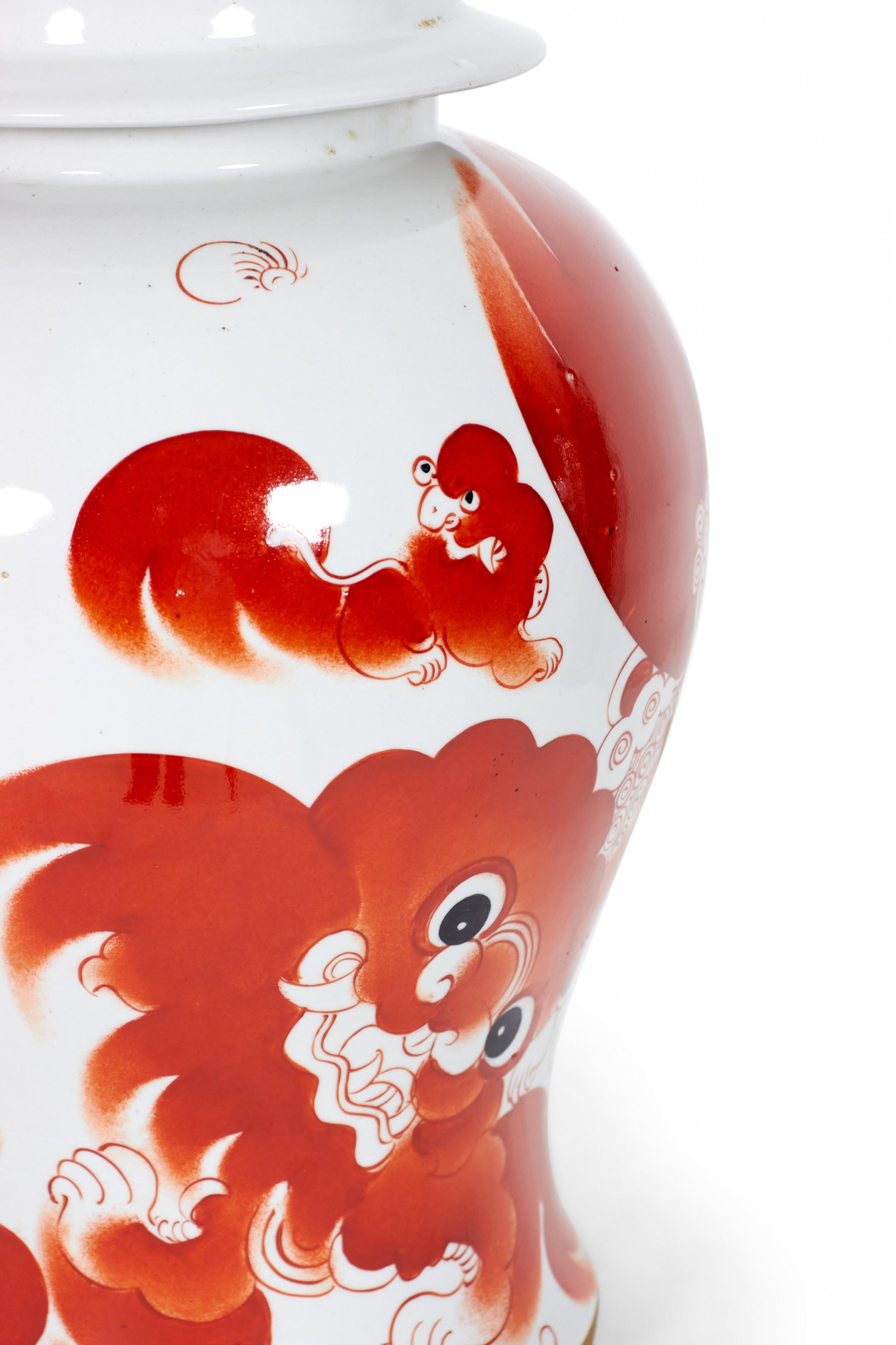 Chinese Export Pair of Antique Chinese Orange Foo Dog Patterned Porcelain Lidded Ginger Jars For Sale