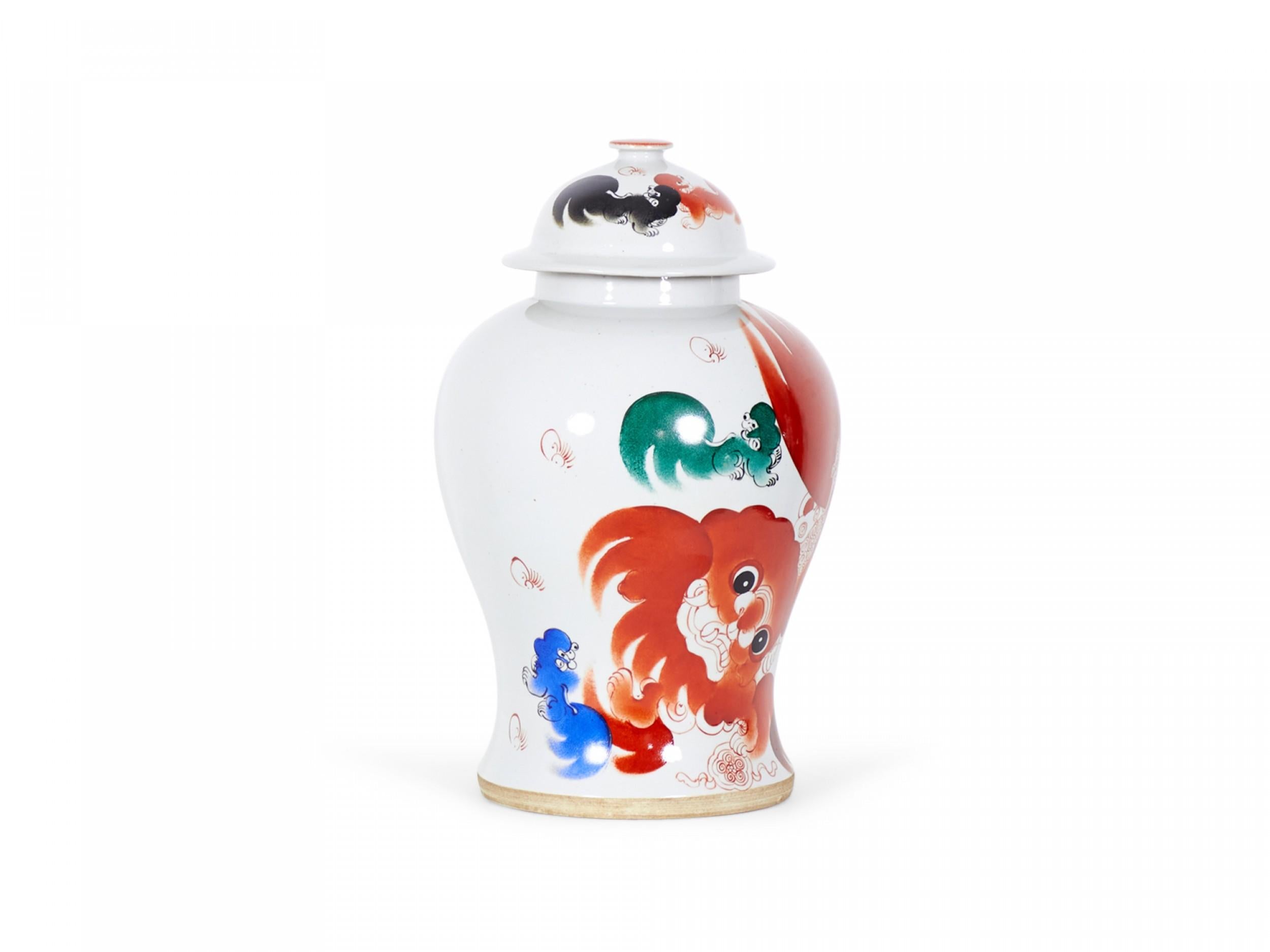 Hand-Crafted Pair of Antique Chinese Orange Foo Dog Patterned Porcelain Lidded Ginger Jars For Sale