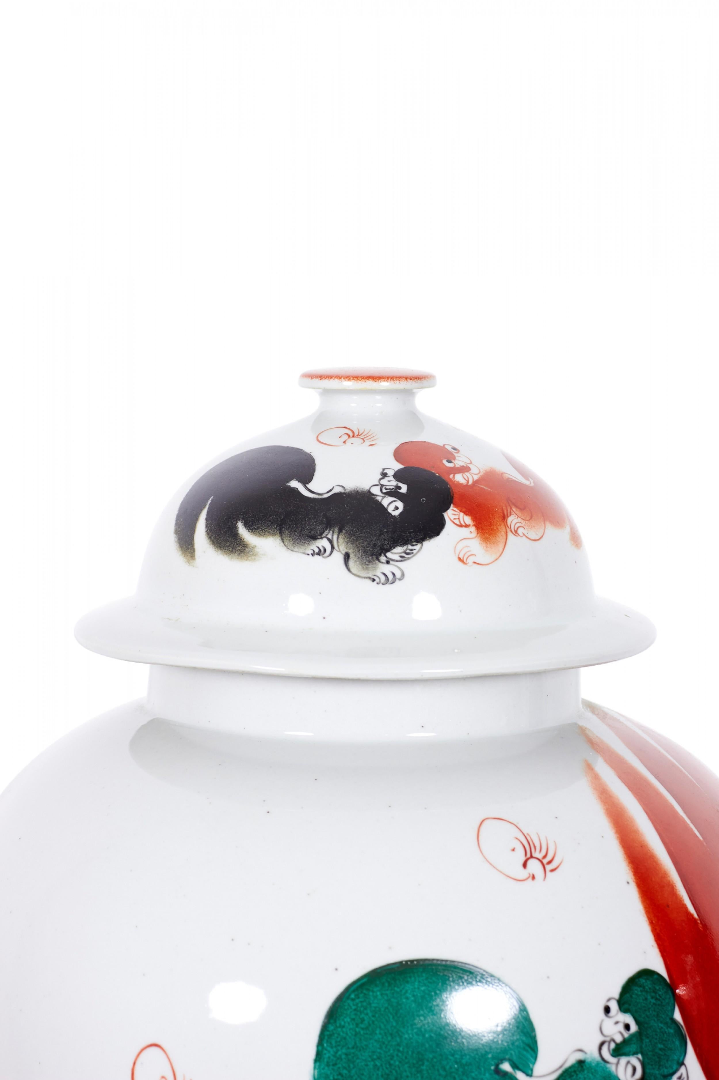 Pair of Antique Chinese Orange Foo Dog Patterned Porcelain Lidded Ginger Jars In Good Condition For Sale In Queens, NY