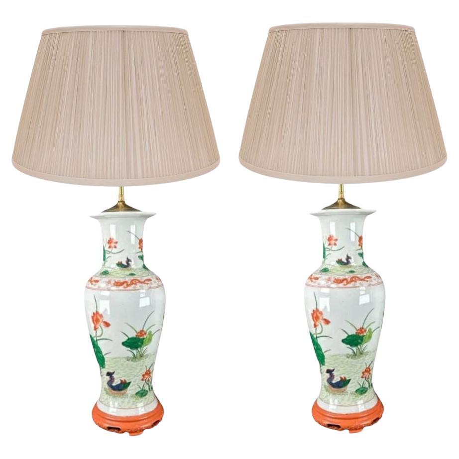 Pair of Antique Chinese Porcelain Lamps With Botanical Detail For Sale