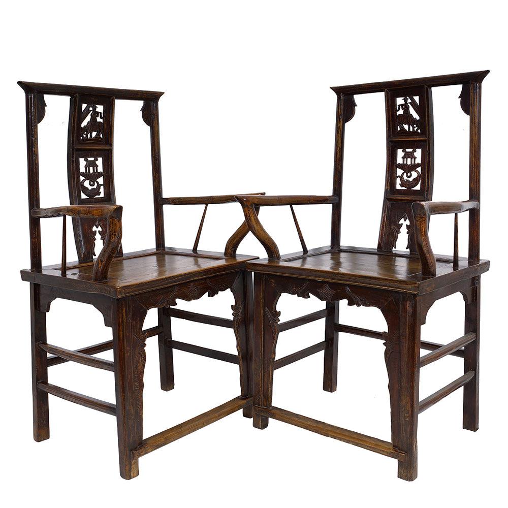 Look at this matching pair of Qing Dynasty Style Official's Hat Armchairs. The members of this chair are delicate and slender. The back splat is made up of three connected sections. It have some openwork medallion carved with Chinese traditional