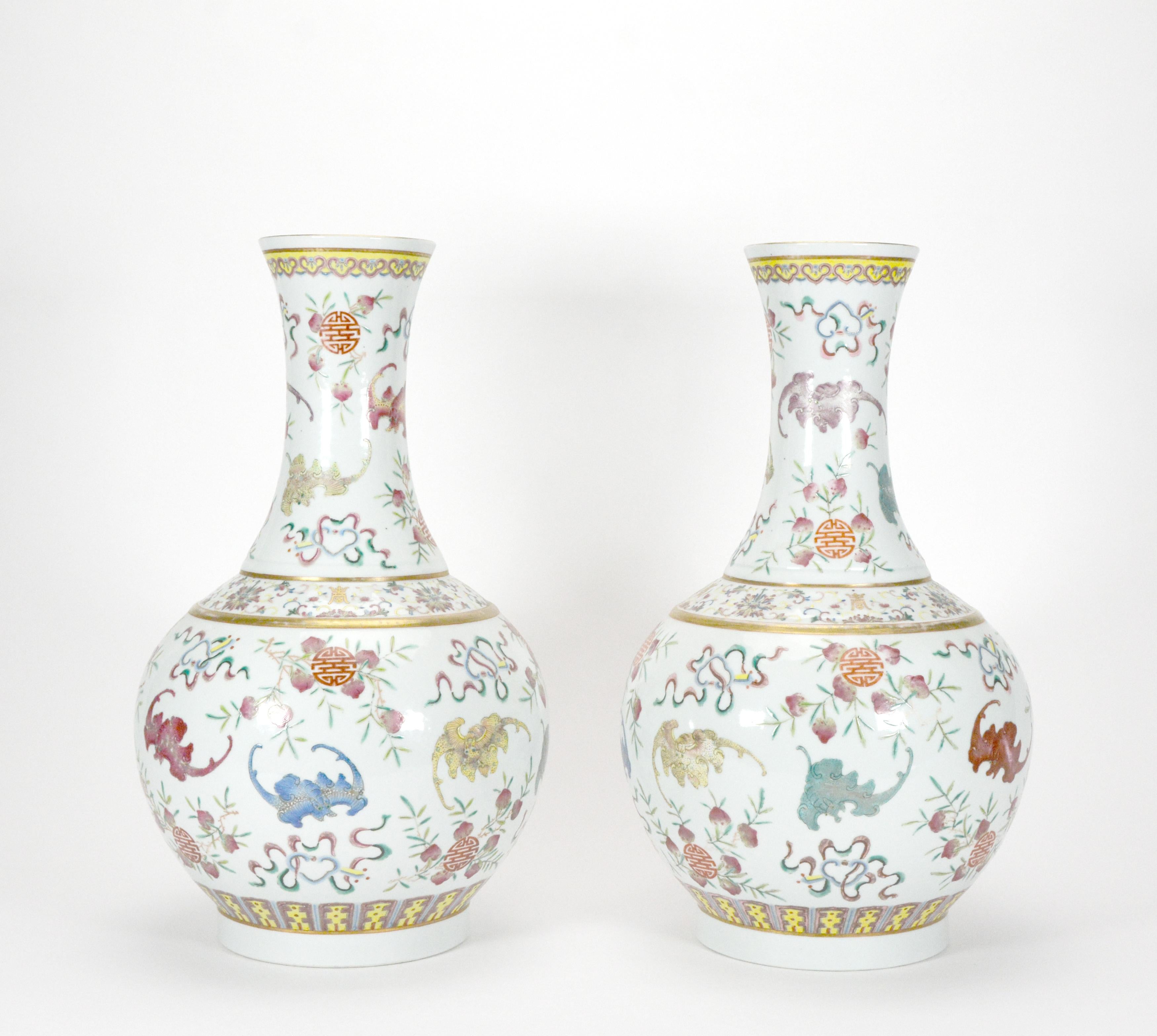 For your consideration is a pair of finely hand painted Chinese globular porcelain vases, from early 20th century. The heavy porcelain body is in elegant globular form and covered with thick creamy white glaze. The top opening rim is painted with