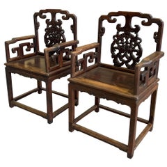 Paire de fauteuils chinois anciens en bois de rose