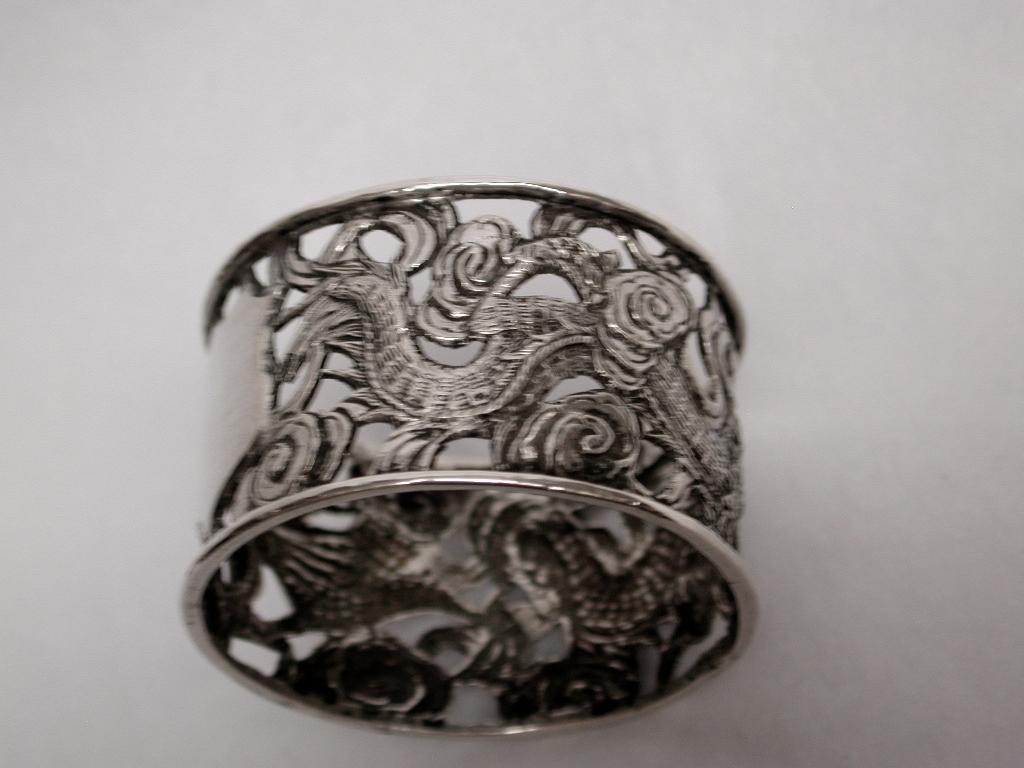 Embossed Pair of Antique Chinese Silver Dragon Napkin Rings, circa 1900