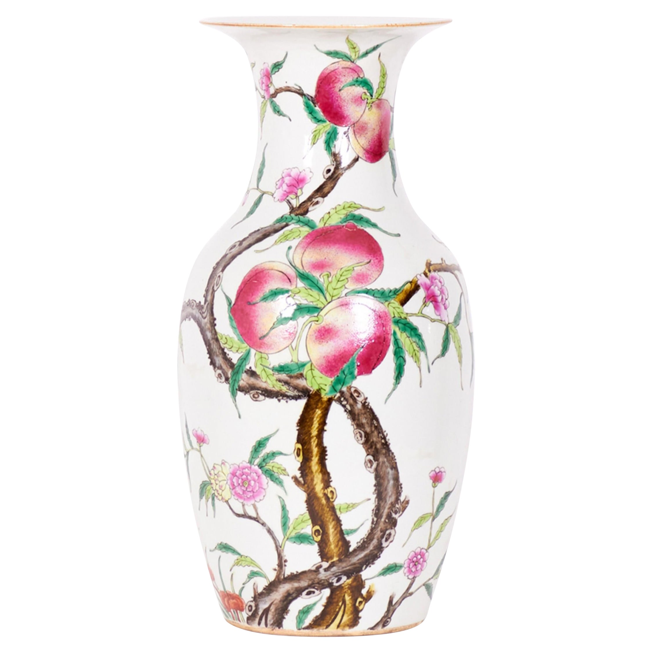 Pareja de jarrones chinos antiguos de porcelana con forma de urna y diseño de árbol frutal en flor