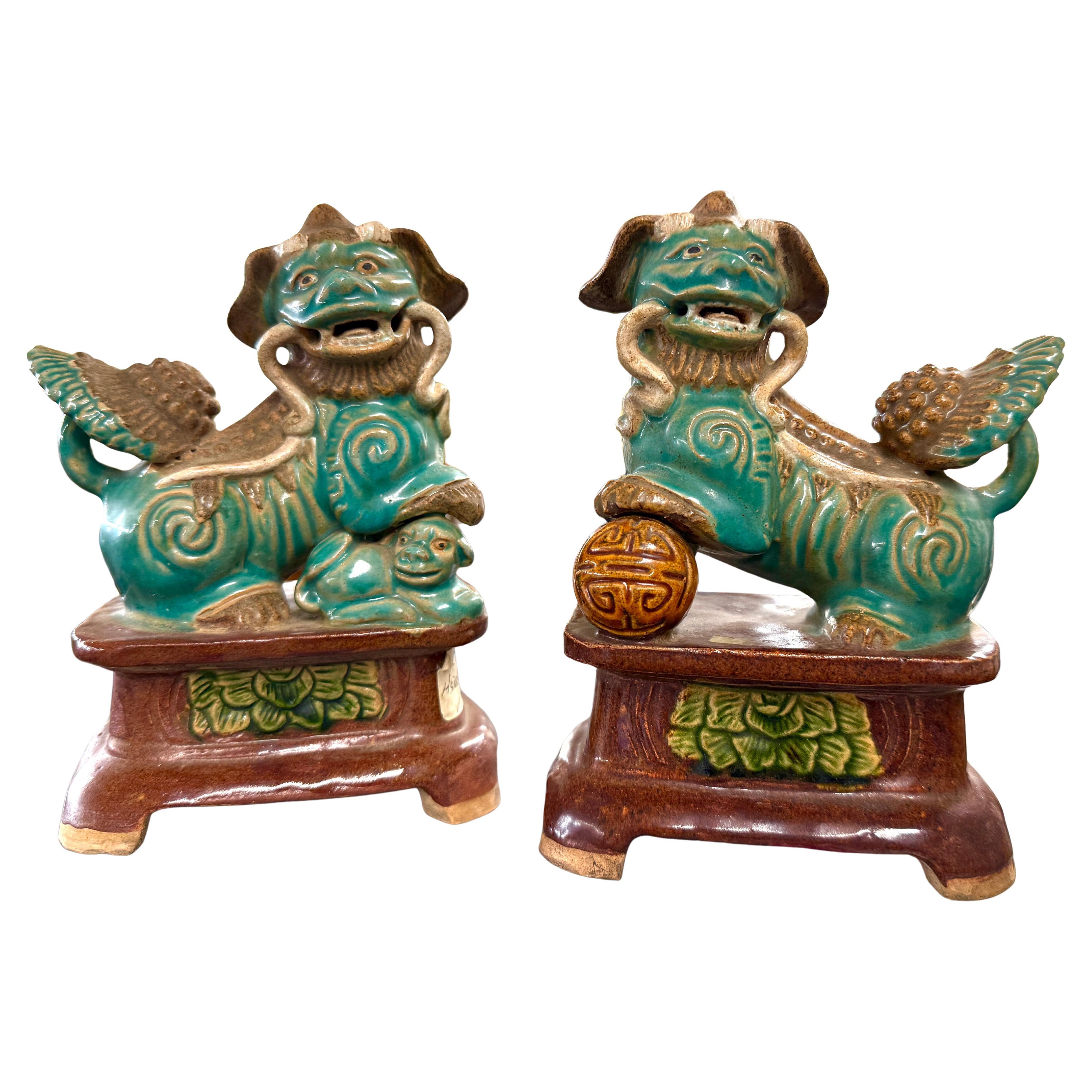 Pair of Antique Chinese Xianfeng Period Enamel Sandstone Foo Dogs or Dragons
