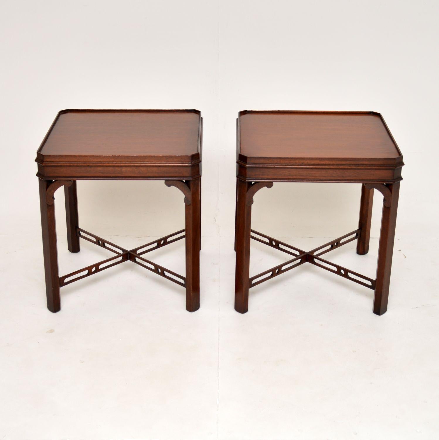 An excellent pair of antique side tables in the Chippendale style. They were made in England, they date from around the 1930’s.

The quality is superb, they are a very useful size and have a beautiful design. The tops have canted corners with