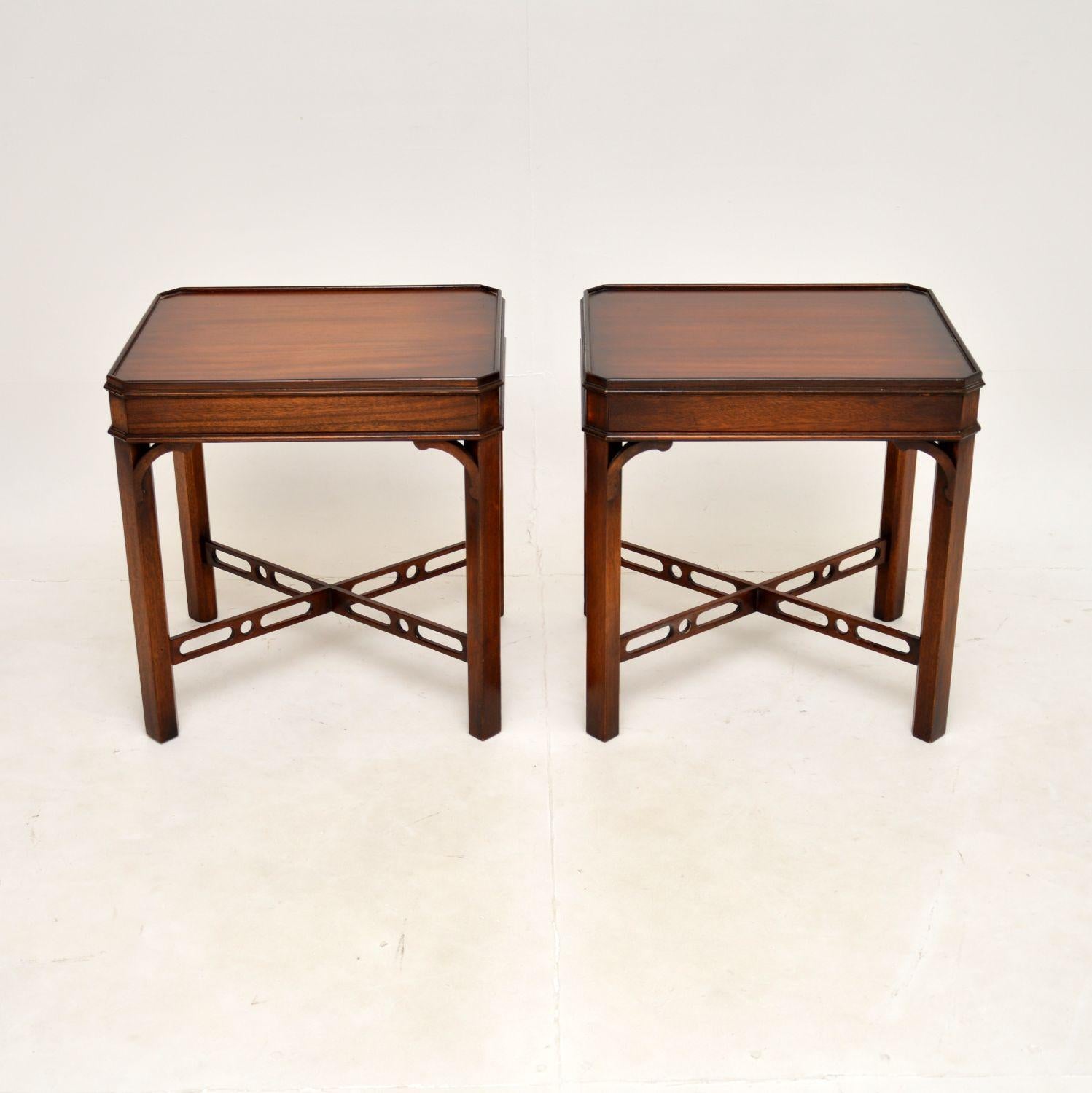A smart and very useful pair of antique side tables in the Georgian style. There were made in England, they date from around the 1950’s.

They are of excellent quality and are a useful size to be used as lamp tables. The rectangular tops have canted