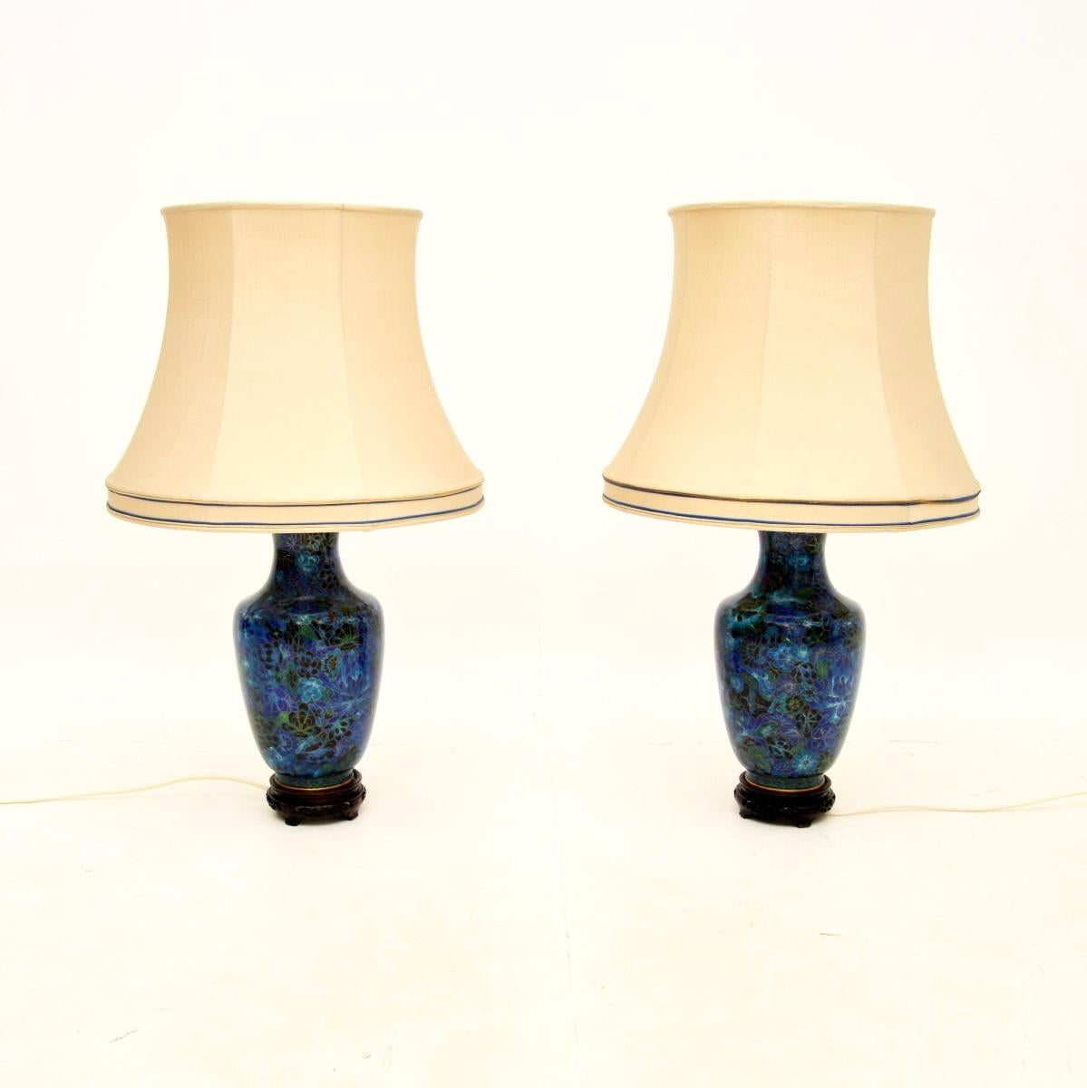 An absolutely stunning pair of antique cloisonné table lamps. They were made in France, and date from around the 1950’s.

The quality is outstanding, they are a very large and impressive size. The enameled cloisonné work is beautifully executed,
