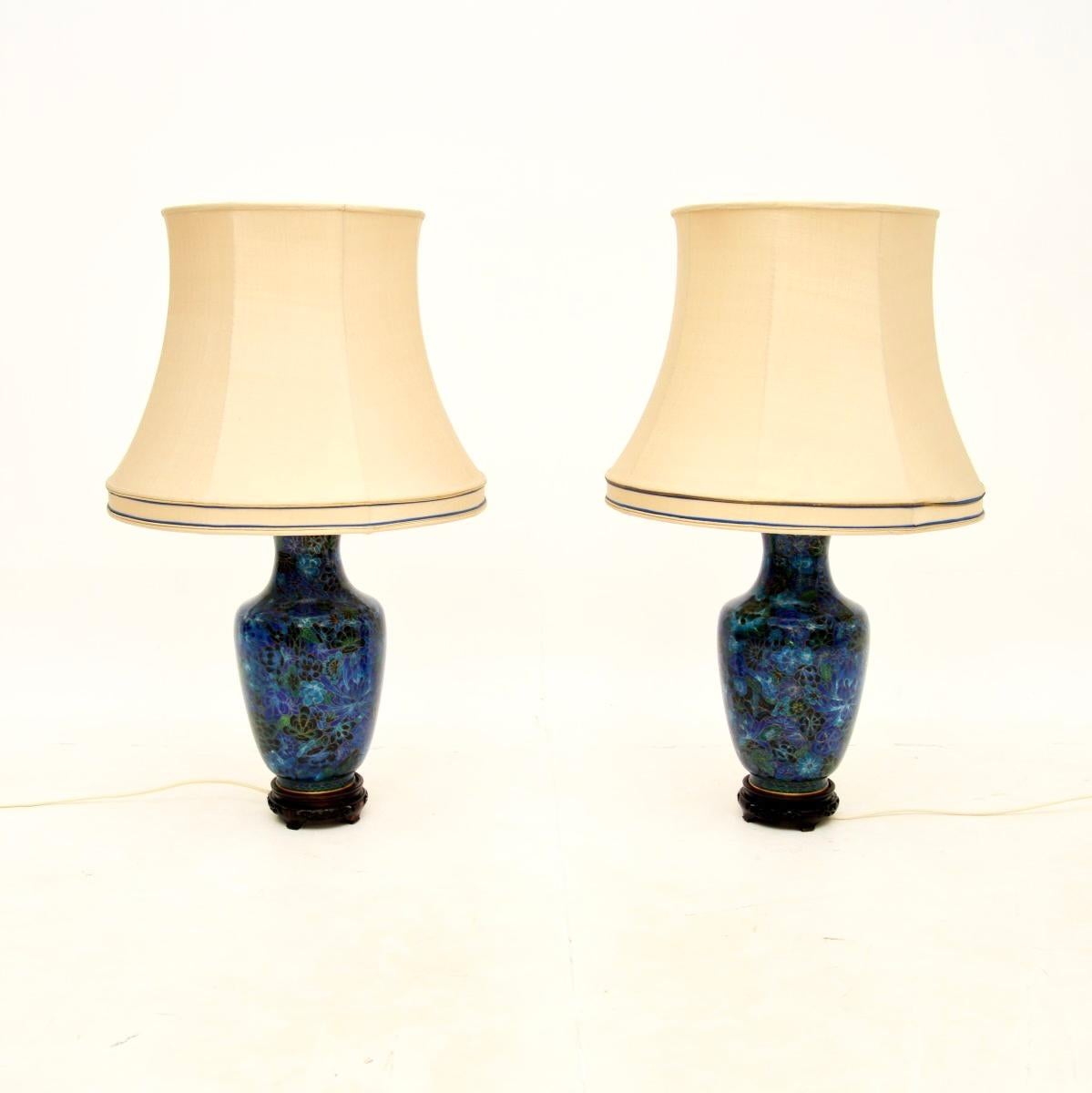 An absolutely stunning pair of antique cloisonné table lamps. They were made in China, and date from around the 1950’s.

The quality is outstanding, they are a very large and impressive size. The enameled cloisonné work is beautifully executed, with