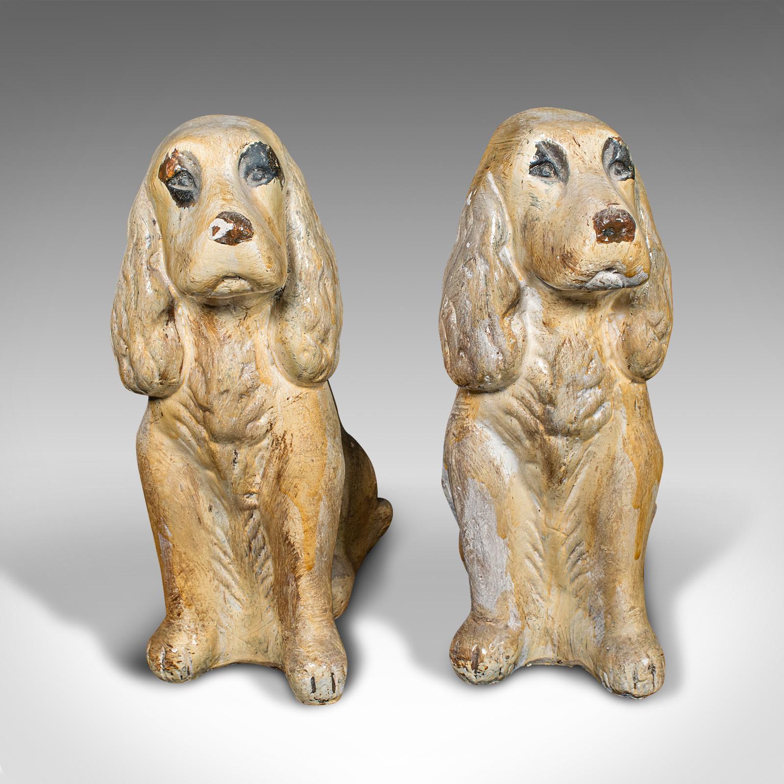 This is a pair of antique cocker spaniel figures. An English, plaster dog fireside ornament or doorstop, dating to the Edwardian period, circa 1910.

Faithful friends, ideal for accentuating the lounge or as doorstops
Displaying a desirable aged