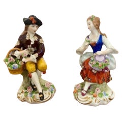 Pair of antique continental porcelain figures