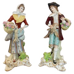 Paire de figurines anciennes en porcelaine continentale