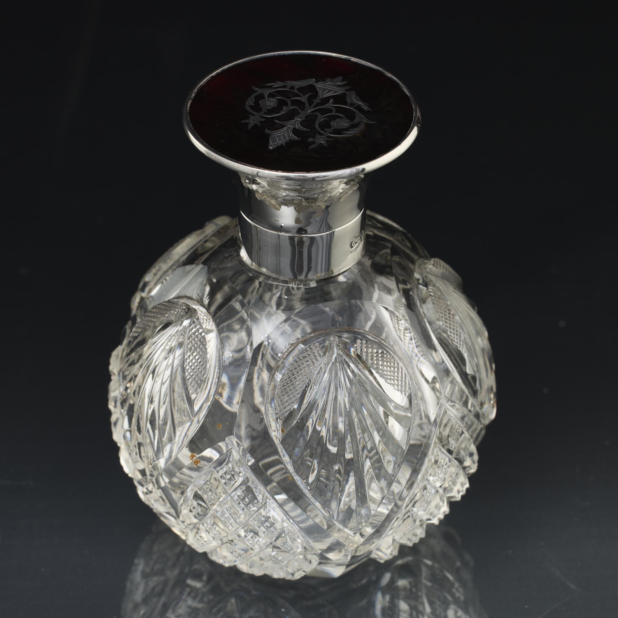 British Pair of antique cut glass perfume bottles with silver & tortoiseshell covers For Sale