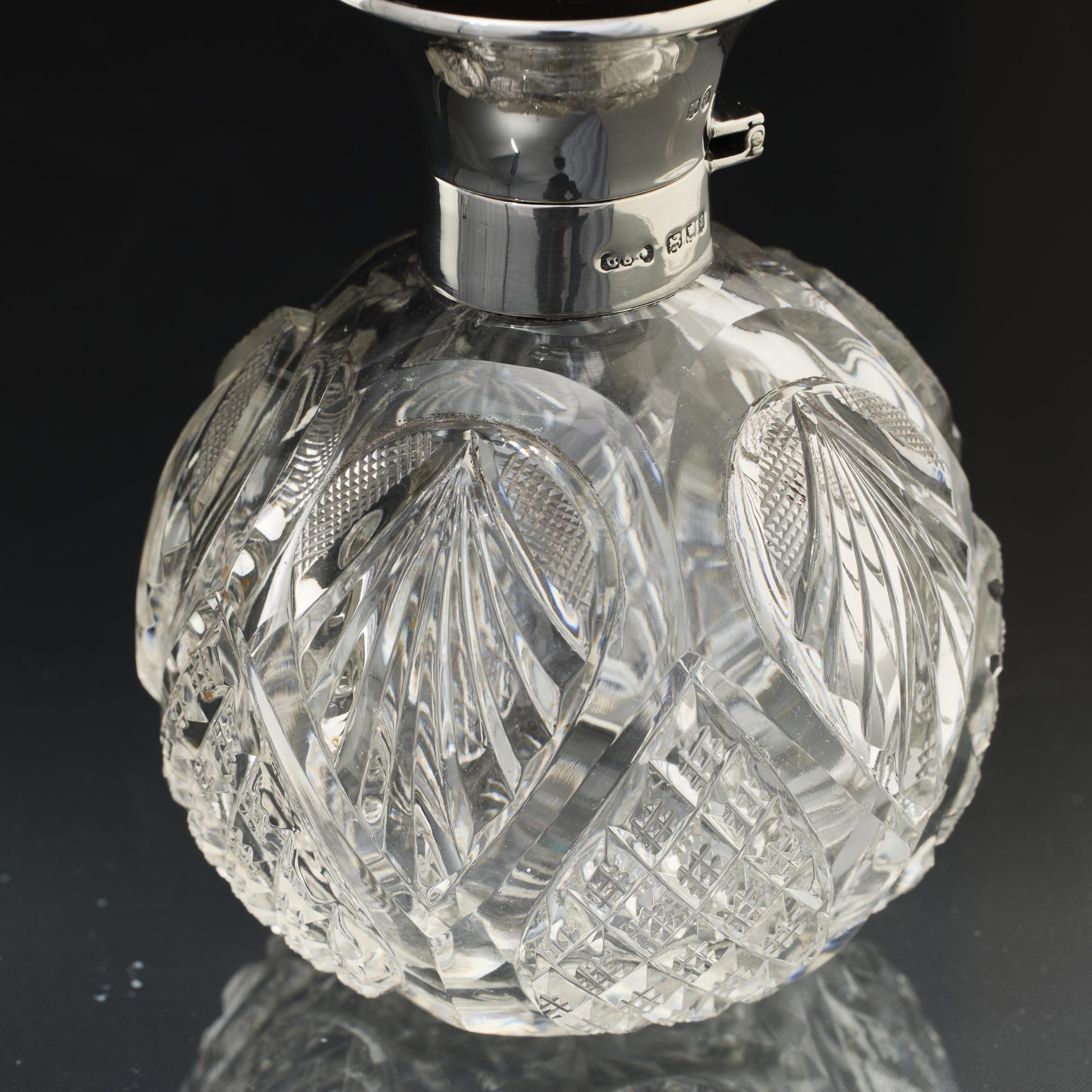Early 20th Century Pair of antique cut glass perfume bottles with silver & tortoiseshell covers For Sale