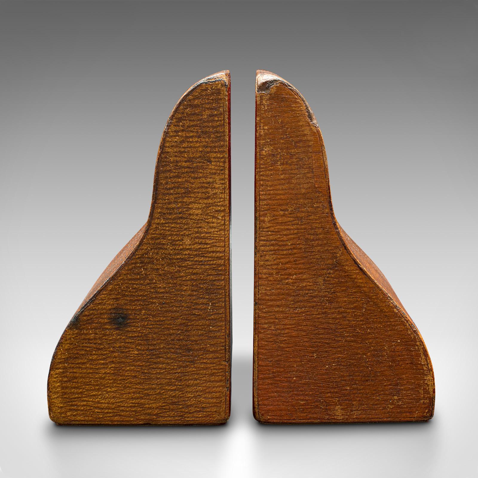 This is a pair of antique decorative bookends. An English, leather dressed book rest, dating to the Edwardian period, circa 1910.

Fascinating colour and tactility to this executive book end
Displays a desirable aged patina and in good order
Quality