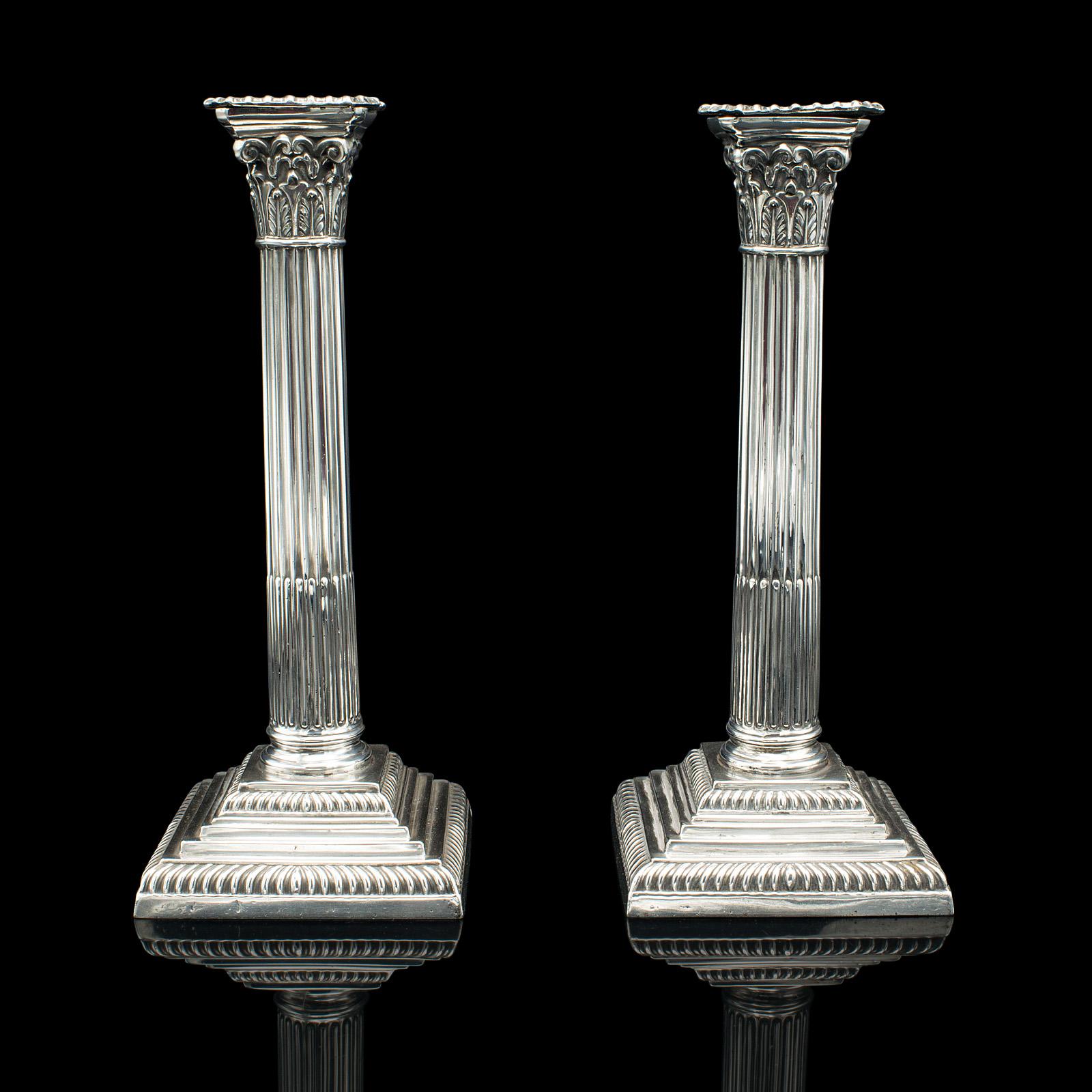 This is a pair of antique decorative candlesticks. An English, silver plated candle stand in classical taste, dating to the late Victorian period, circa 1900.

Delightful candle stands with a traditional aesthetic
Displaying a desirable aged patina