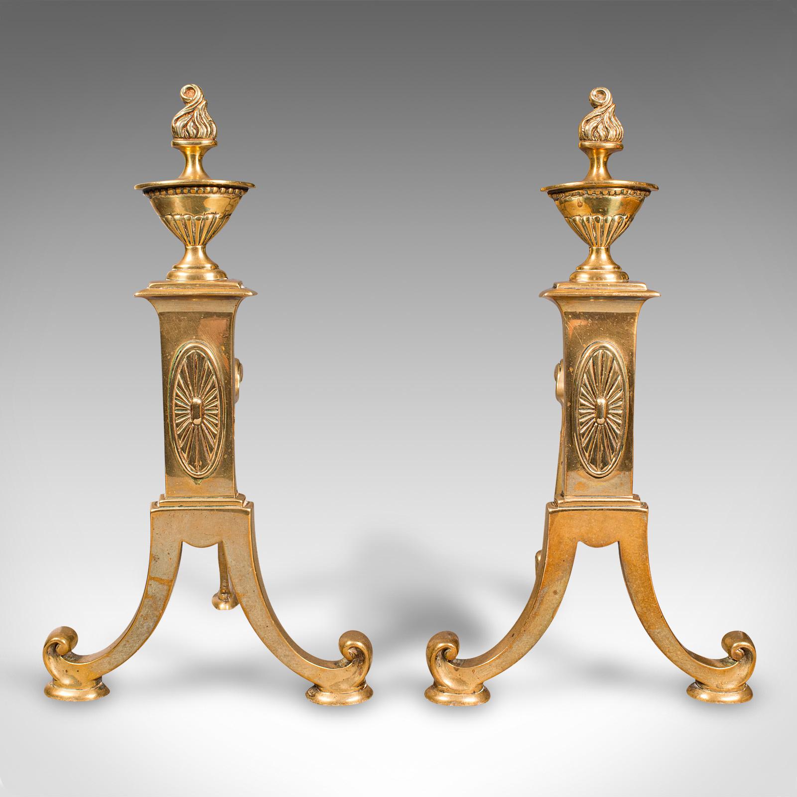 This is a pair of antique decorative fireside tool rests. An English, brass andiron or fire dog, dating to the early Victorian period, circa 1840.

Elegant decorative appeal and of great color
Displaying a desirable aged patina and in good