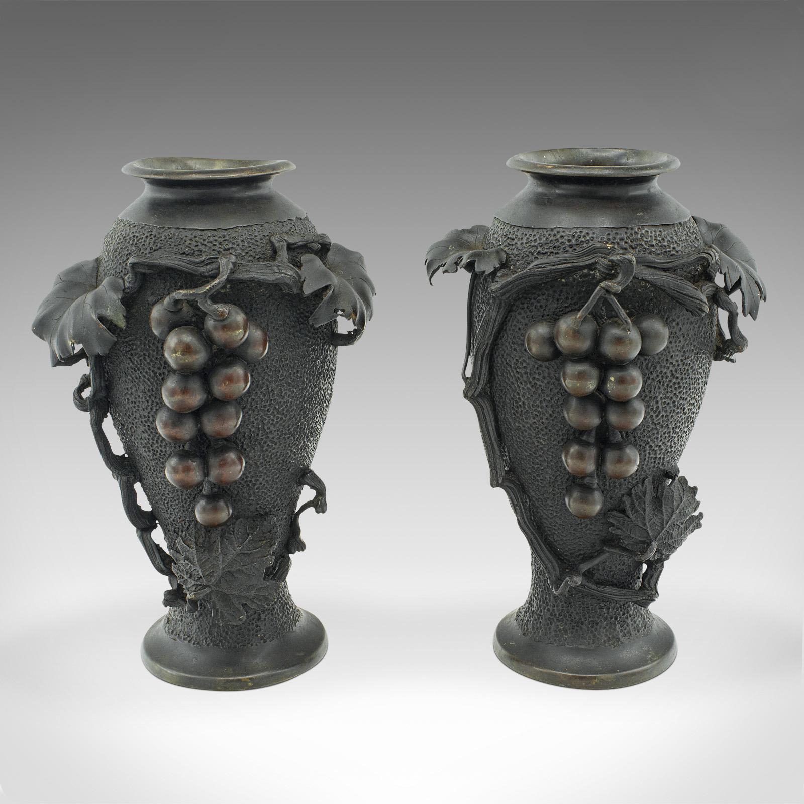 This is a pair of antique decorative vases. A Japanese, bronze baluster from the Meiji period, dating to the mid Victorian period, circa 1870.

Strikingly sculpted and finished vases of appealing proportion
Displaying a desirable aged patina
Dark