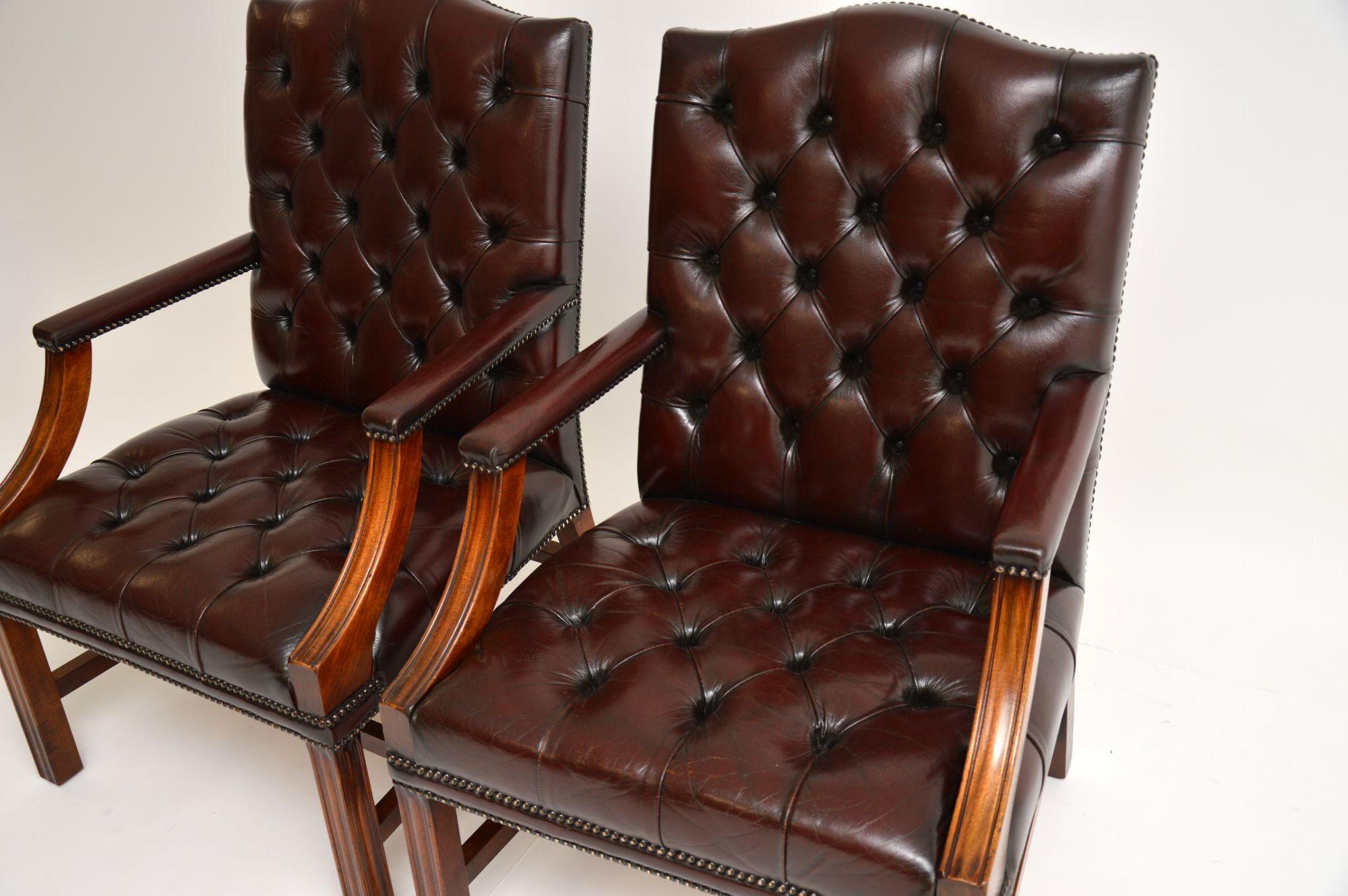 20th Century Pair of Antique Deep Buttoned Leather Library Armchairs