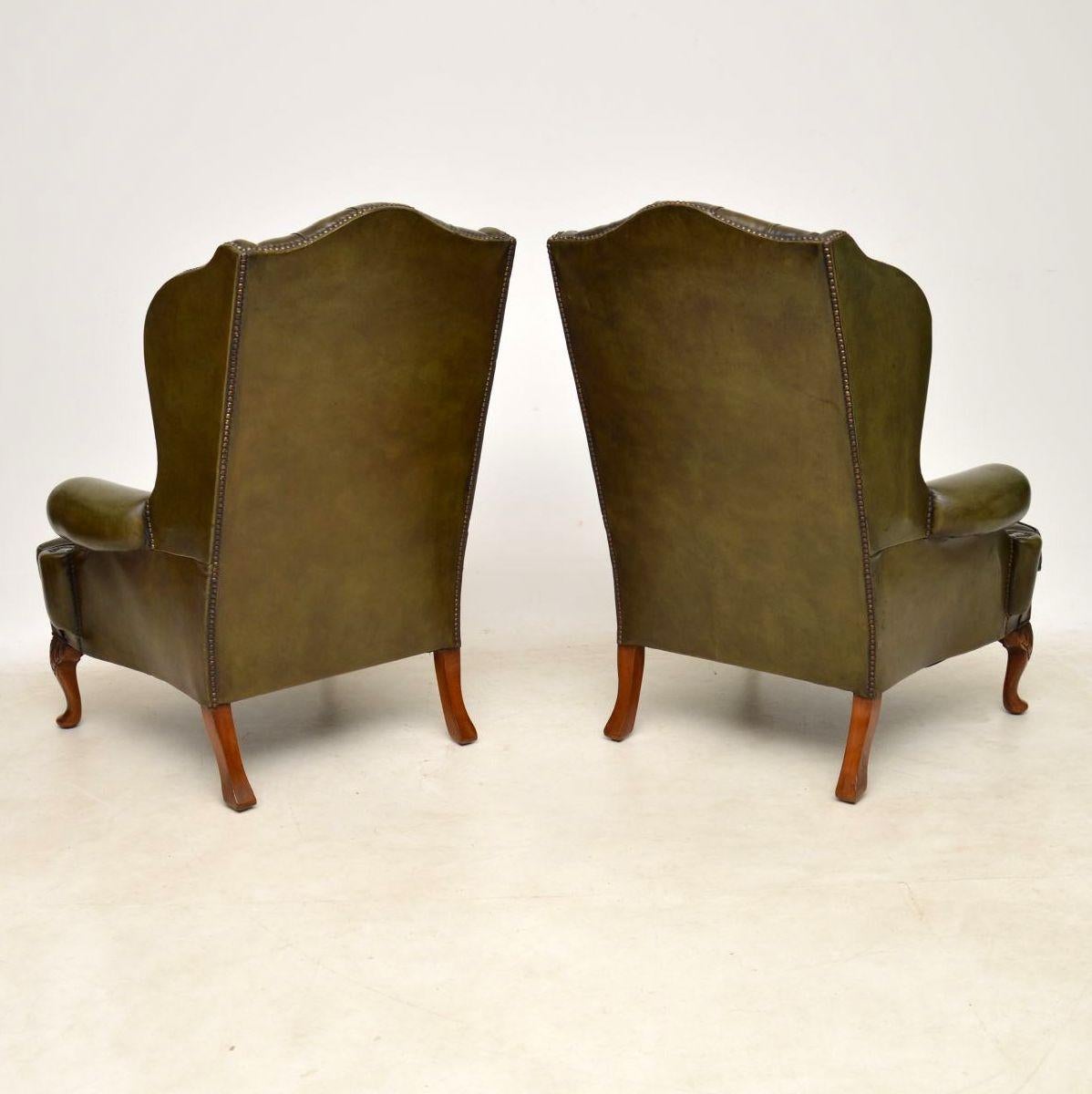 English Pair of Antique Deep Buttoned Leather Wingback Armchairs