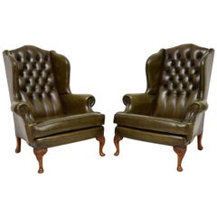 Pair of Antique Deep Buttoned Leather Wingback Armchairs