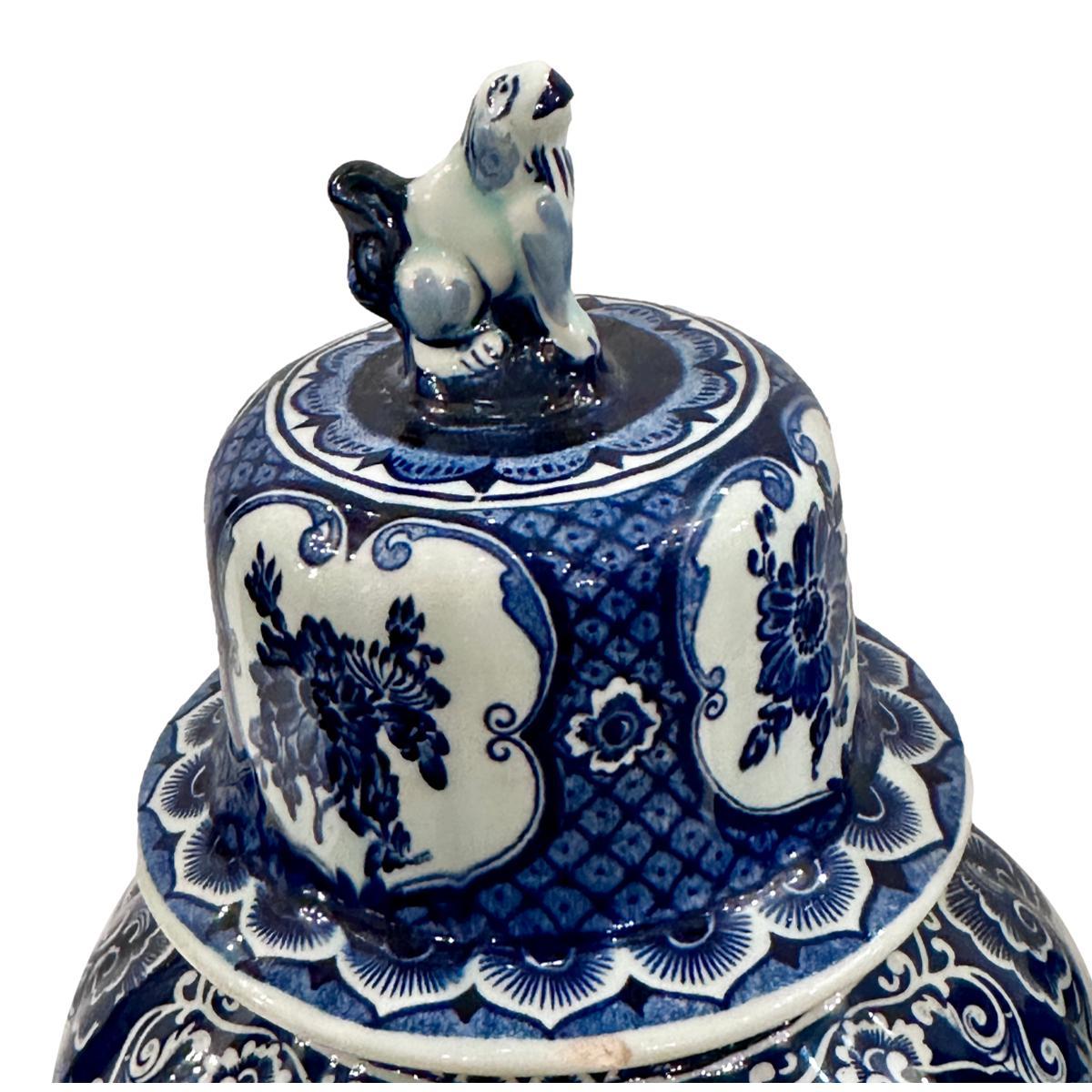Pair of 19th Century Dutch white and blue vases.

Measurements:
Height: 11