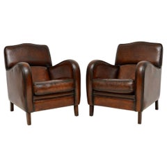 Pair of Antique Distressed Leather Armchairs