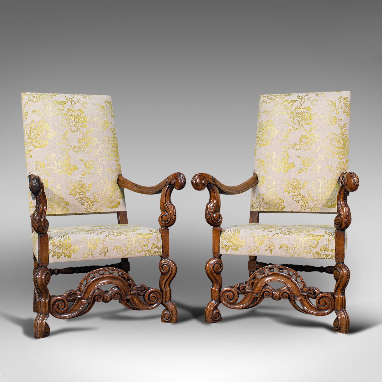 This is a superb pair of antique drawing room elbow chairs. An English, walnut armchair or lounge seat, dating to the late Georgian period, circa 1820.

Carved elbow chairs of exquisite quality and finish
Displaying a desirable aged patina and in