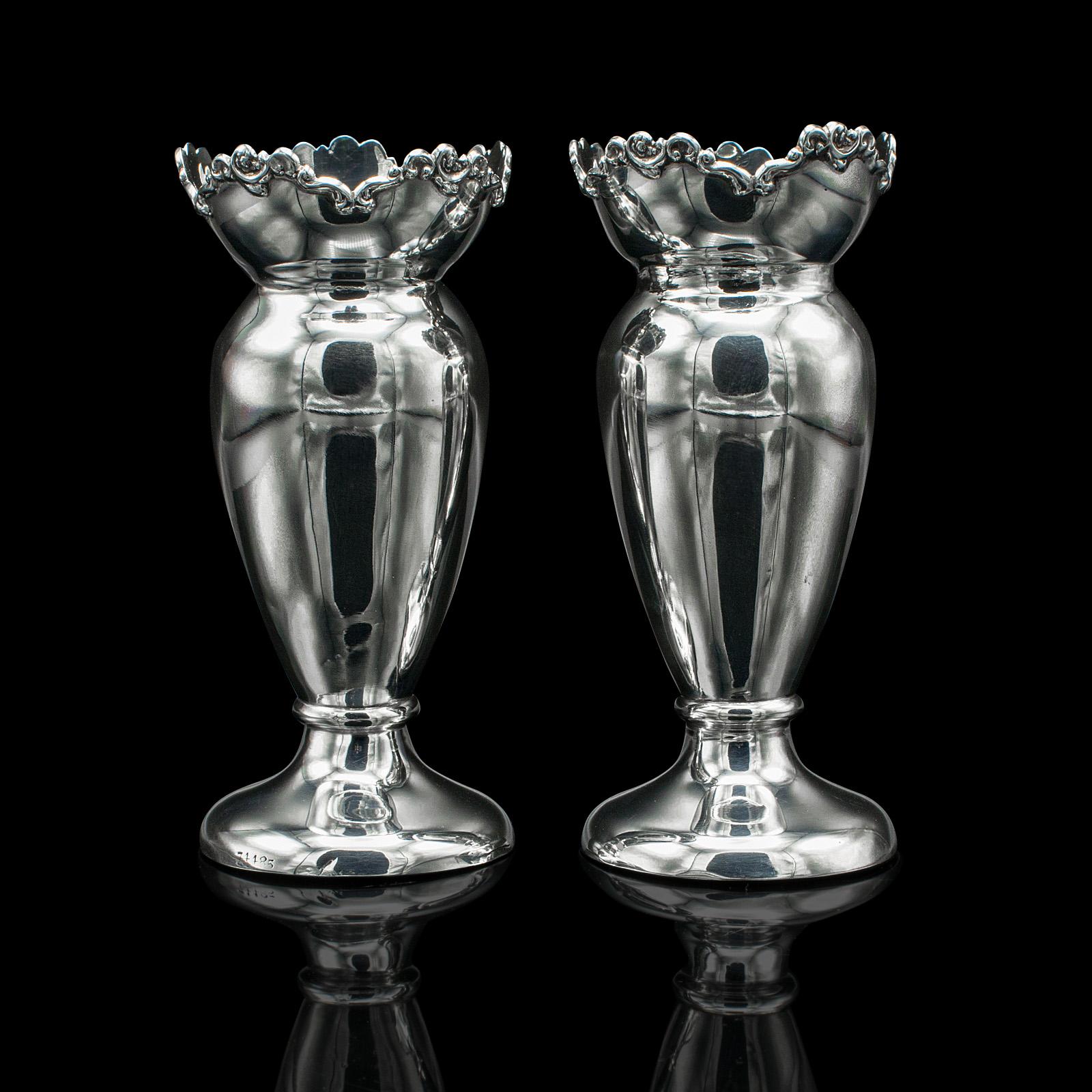 This is a pair of antique duck egg cups. An English, sterling silver posy vase, dating to the Edwardian period, hallmarked 1904.

Fascinating silver examples, ideal for use at the breakfast table
Displaying a desirable aged patina and in good order