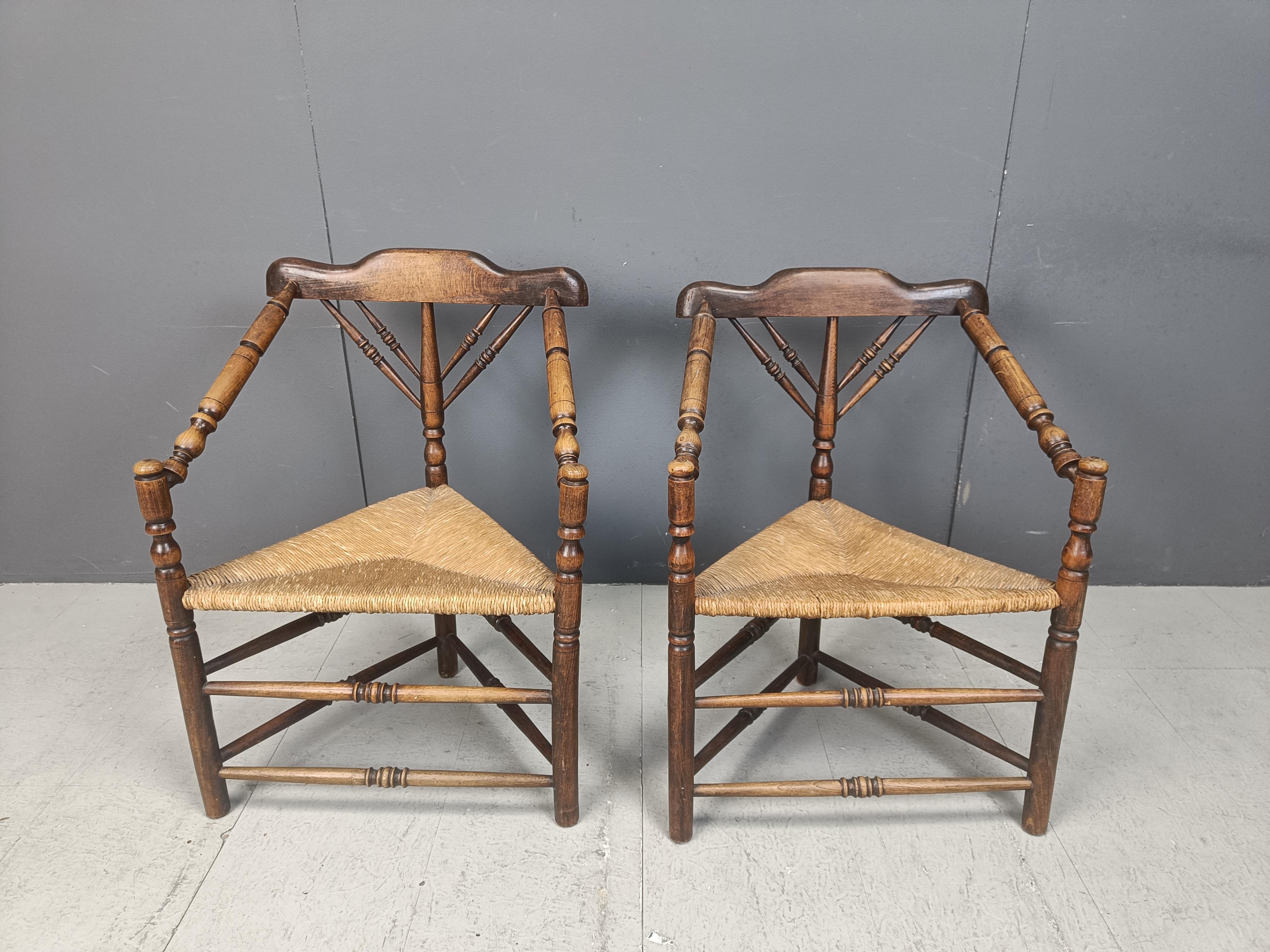 Elegant antique dutch tripod corner chairs made from beautifully crafted wooden frames and rush seats.

These antique chairs ahve a beautiful design and have a both functional and very decorative purpose.

1920s - Netherlands

Good