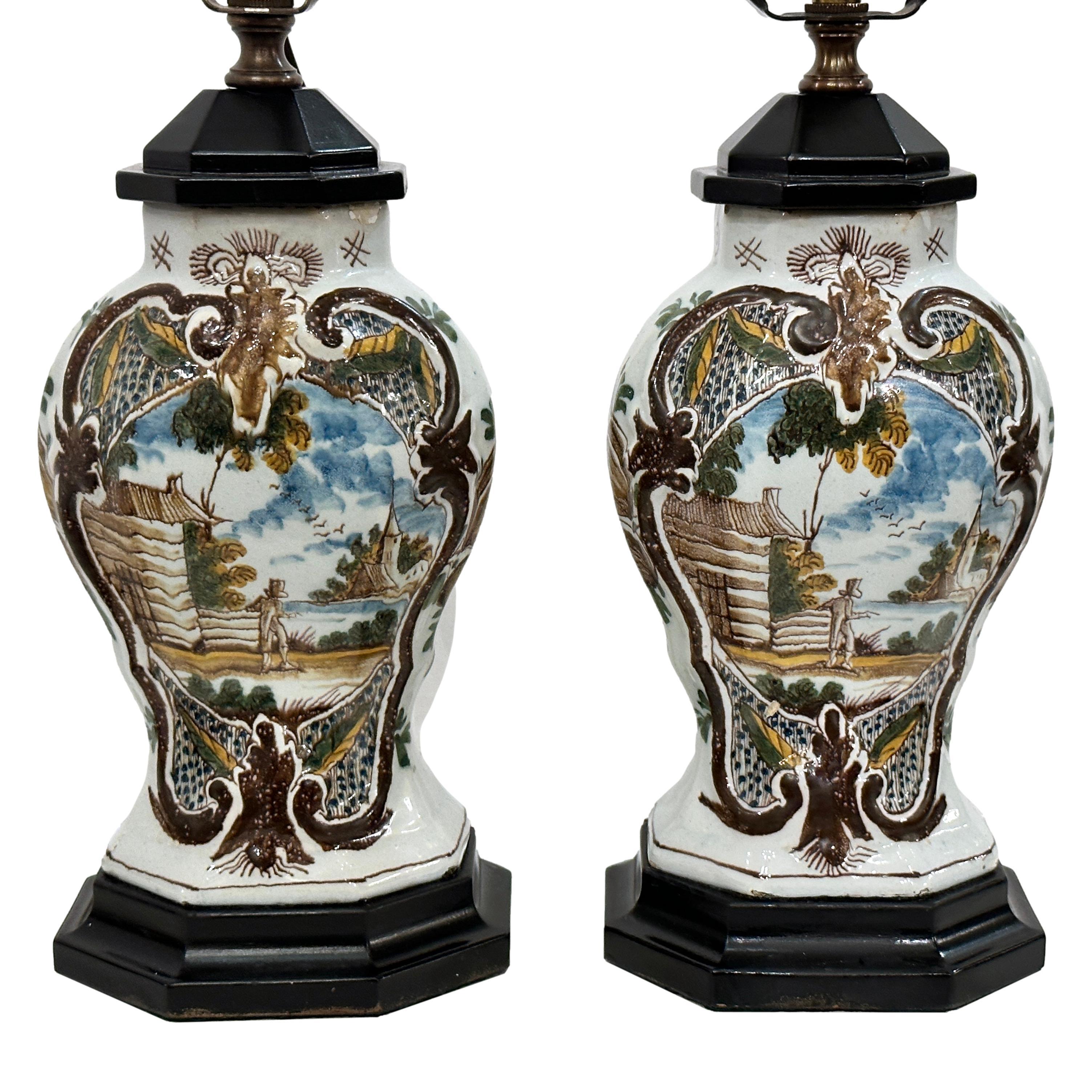 Pair of circa 1920's antique porcelain table lamps.

Measurements:
Height of body: 11