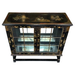 Pair of Antique Ebonized Chinoiserie Cabinets